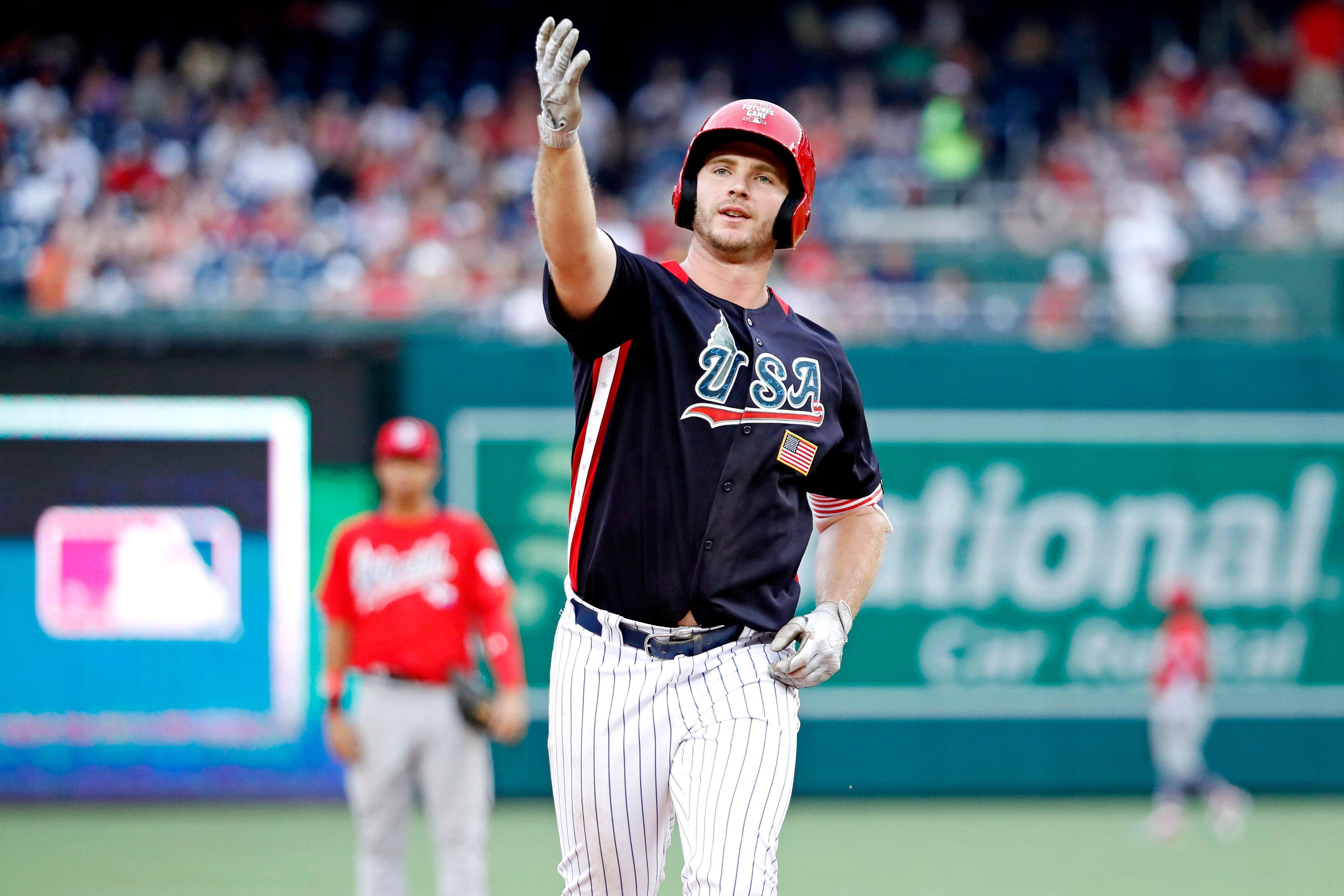 USA infielder Peter Alonso hits a two-run home run in seventh inning against the World Team during the 2018 All Star Futures Game at Nationals Park. / Geoff Burke/USA TODAY Sports