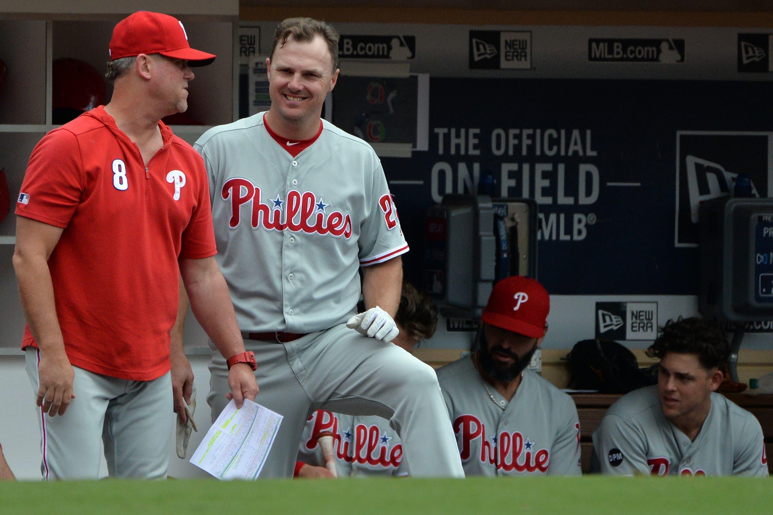 Jun 5, 2019; San Diego, CA, USA; Philadelphia Phillies left fielder Jay Bruce (middle) talks with hitting coach John Mallee (8) during the ninth inning against the San Diego Padres at Petco Park. Mandatory Credit: Jake Roth-USA TODAY Sports / Jake Roth