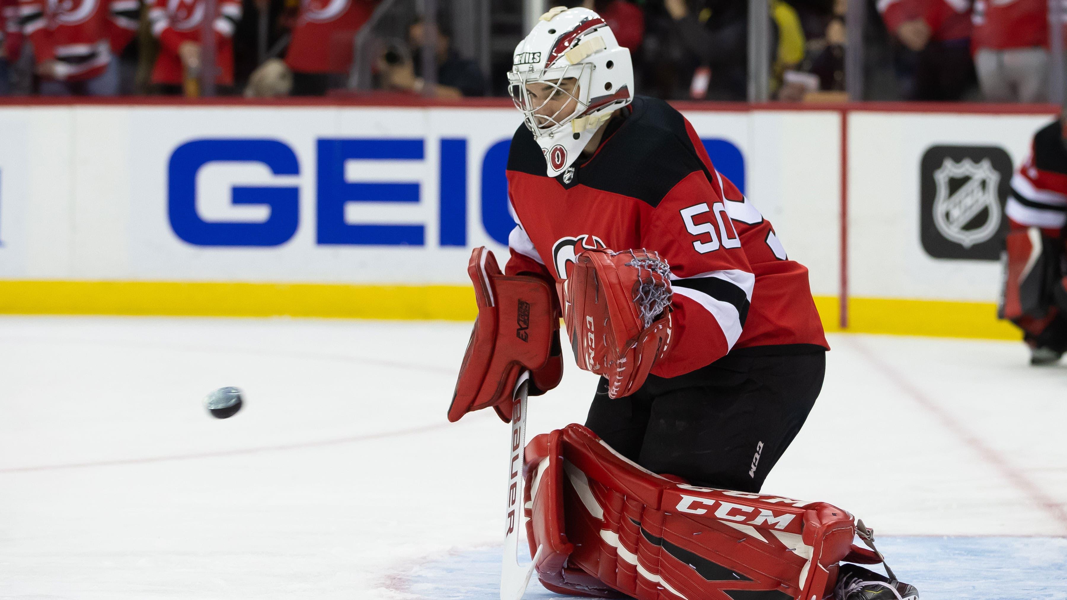 Oct 23, 2021; Newark, New Jersey, USA; New Jersey Devils goaltender Nico Daws (50) warms up before the game against Buffalo Sabres at Prudential Center. / Tom Horak-USA TODAY Sports