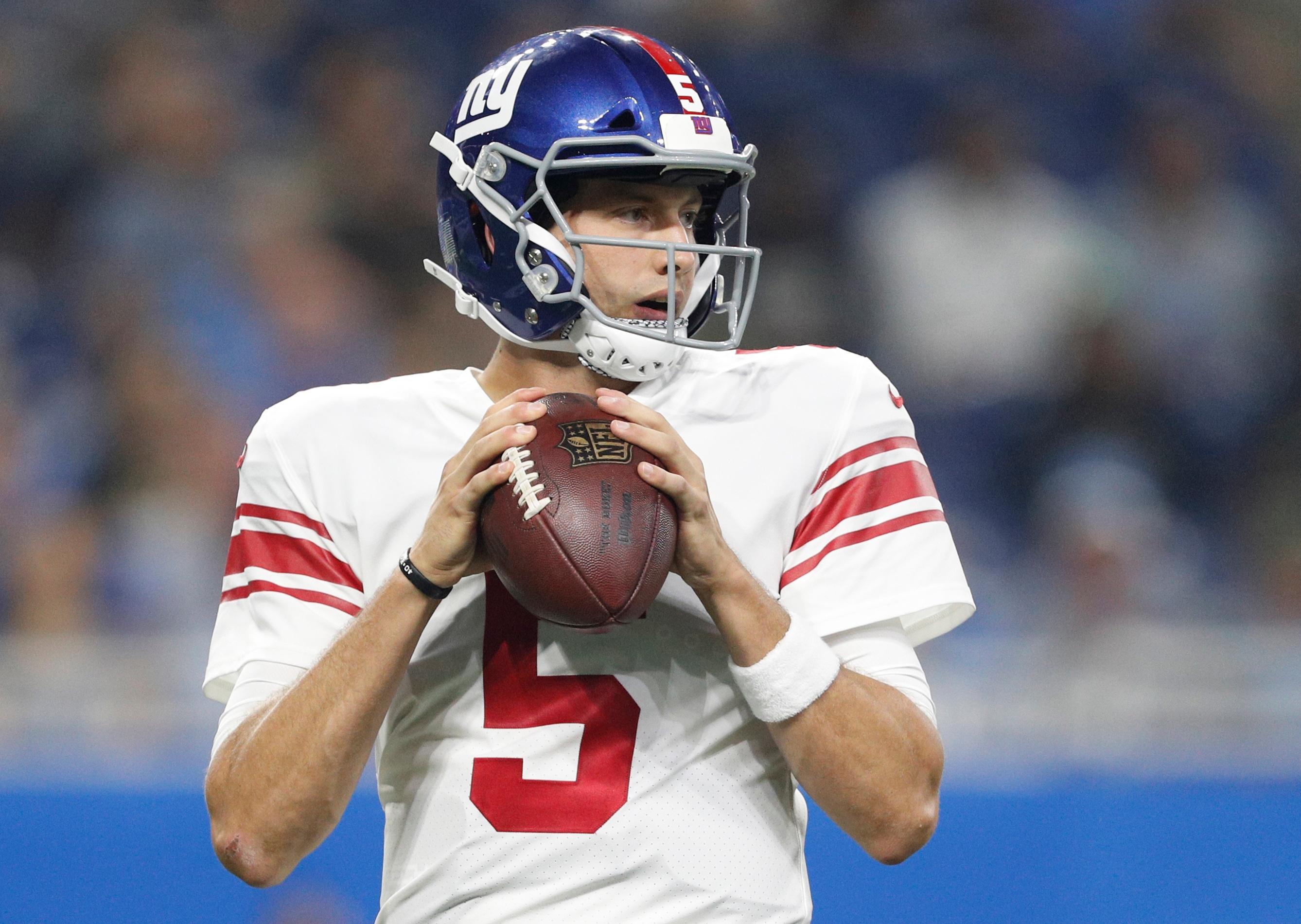 Aug 17, 2018; Detroit, MI, USA; New York Giants quarterback Davis Webb (5) looks for an open man during the first quarter against the Detroit Lions at Ford Field. Mandatory Credit: Raj Mehta-USA TODAY Sports