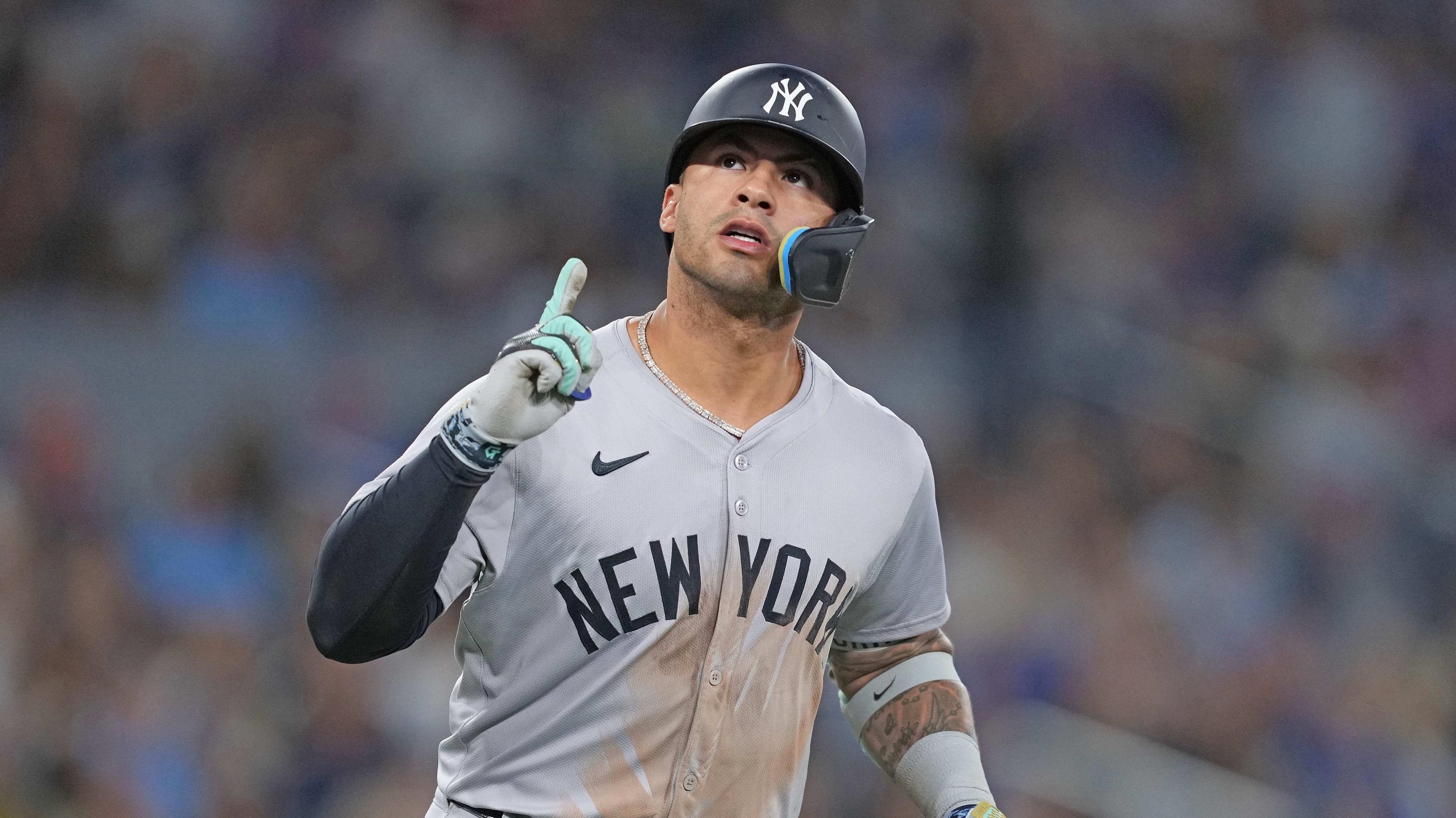 New York Yankees second base Gleyber Torres (25) celebrates after hitting a home run against the Toronto Blue Jays during the sixth inning at Rogers Centre. / Nick Turchiaro-USA TODAY Sports