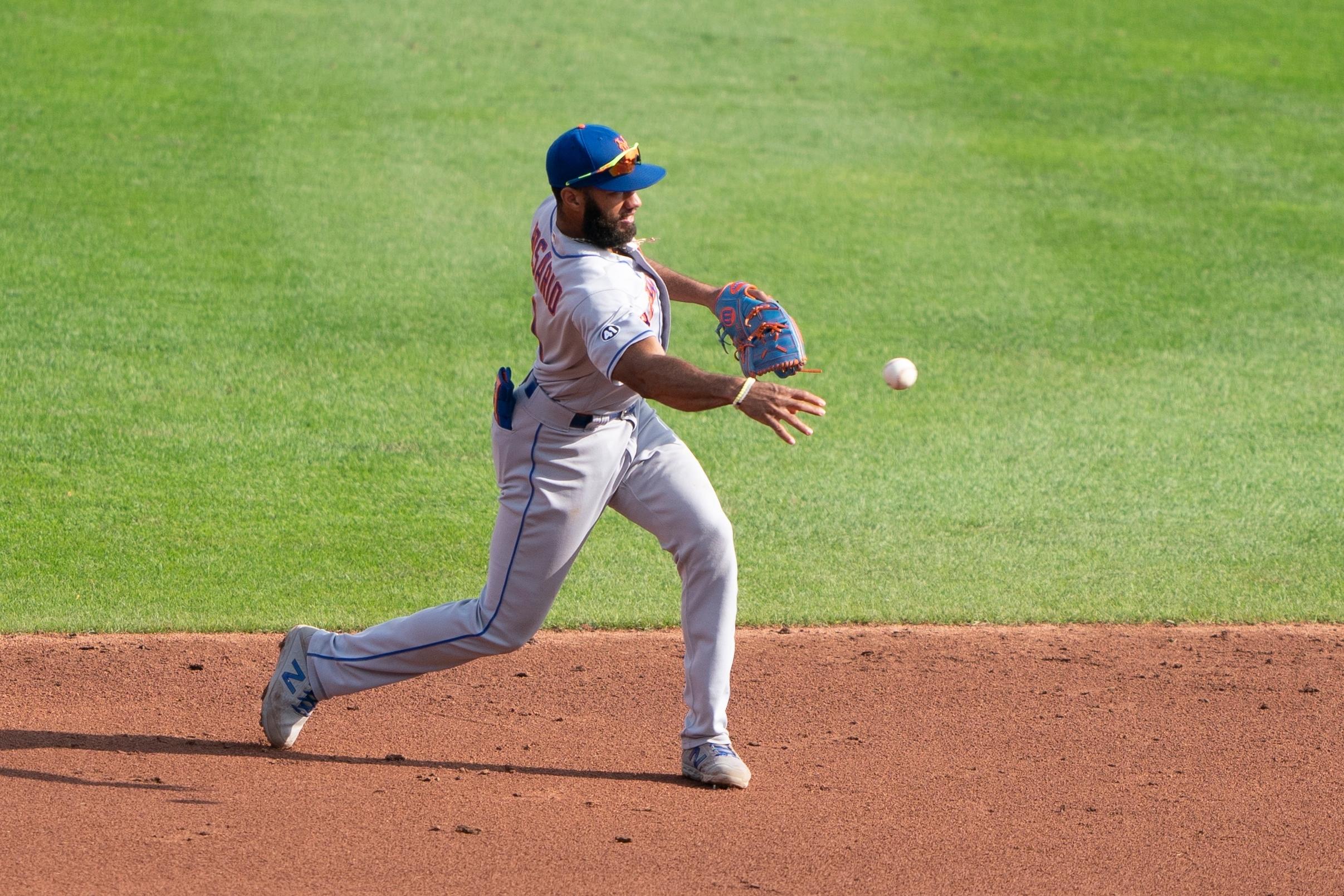 Sep 13, 2020; Buffalo, New York, USA; New York Mets shortstop Amed Rosario (1) throws the ball to second base after fielding a ground ball hit by Toronto Blue Jays center fielder Randal Grichuk (15) (not pictured) during the third inning at Sahlen Field. Mandatory Credit: Gregory Fisher-USA TODAY Sports / © Gregory Fisher-USA TODAY Sports