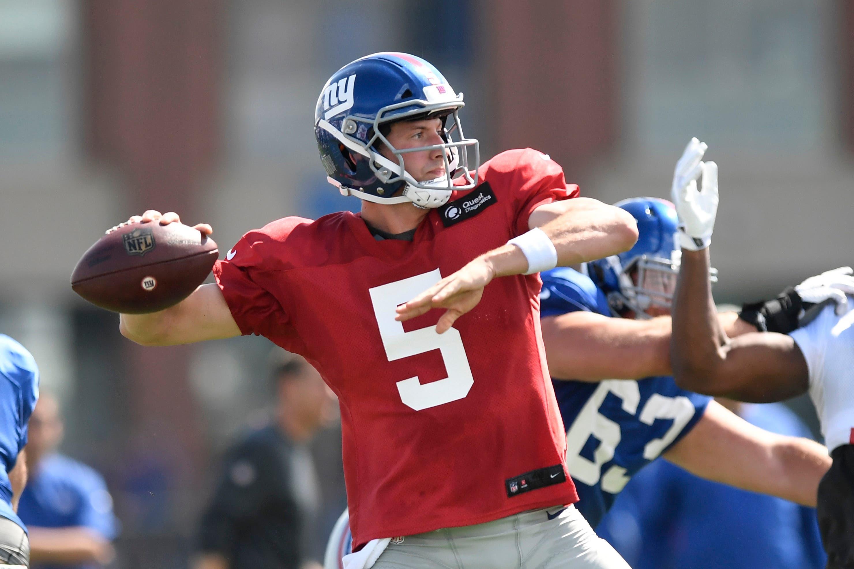 Aug 1, 2018; East Rutherford, NJ, USA; New York Giants quarterback Davis Webb (5) throws the ball during training camp in East Rutherford. Mandatory Credit: Danielle Parhizkaran/NorthJersey.com via USA TODAY NETWORK / Danielle Parhizkaran