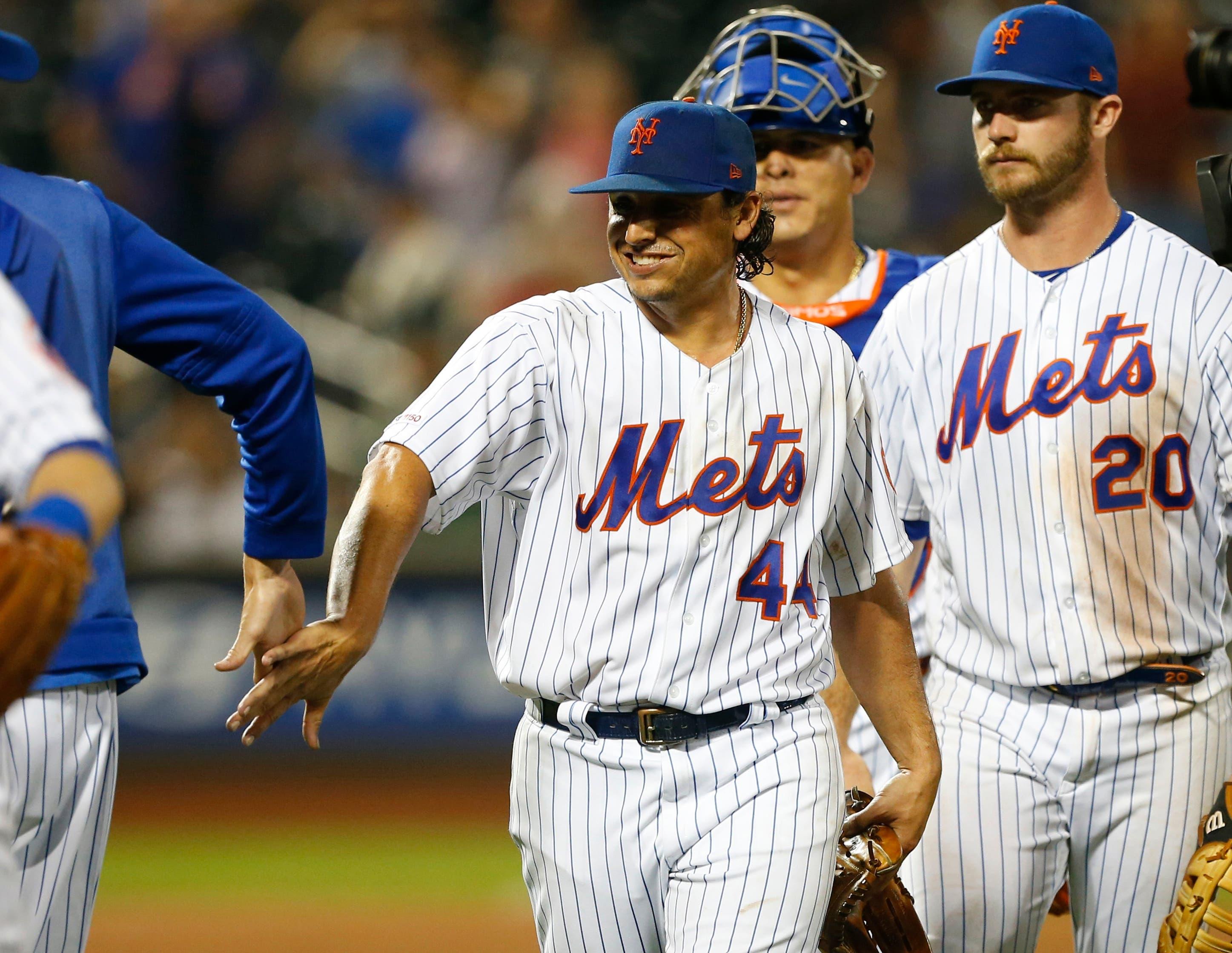 Jun 5, 2019; New York City, NY, USA; New York Mets starting pitcher Jason Vargas (44) celebrates with teammates after defeating the San Francisco Giants at Citi Field. Mandatory Credit: Noah K. Murray-USA TODAY Sports / Noah K. Murray