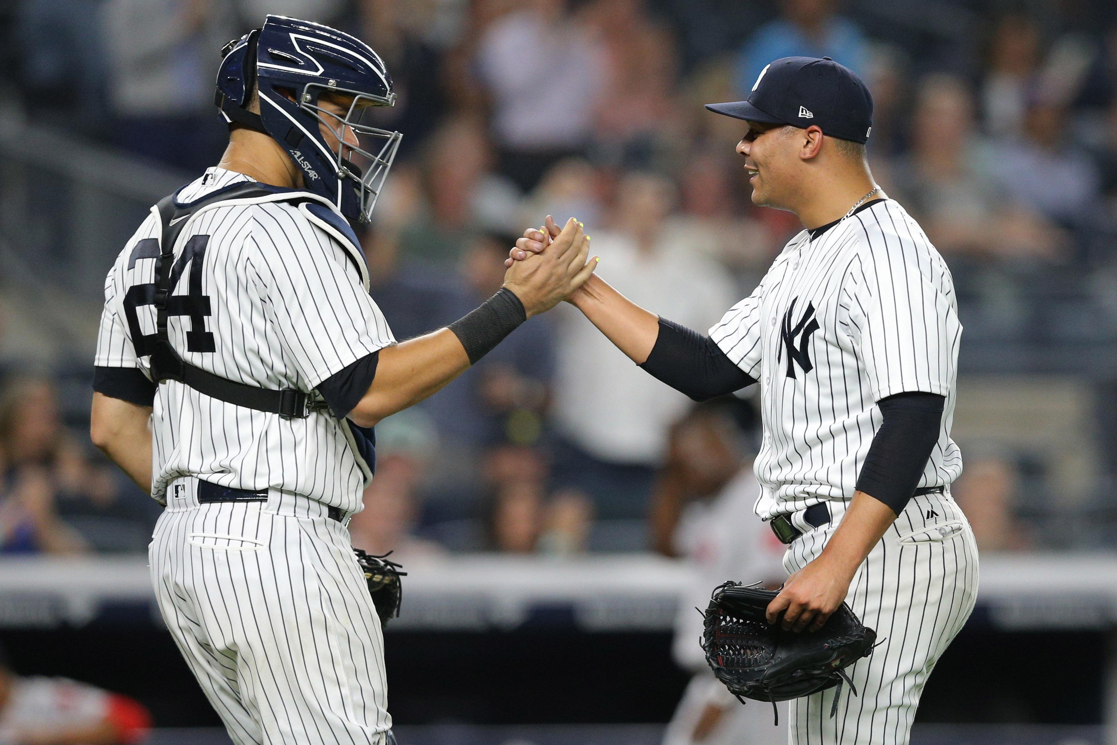 Gary Sanchez (24) Justus Sheffield (61) Mandatory Credit: Brad Penner-USA TODAY Sports