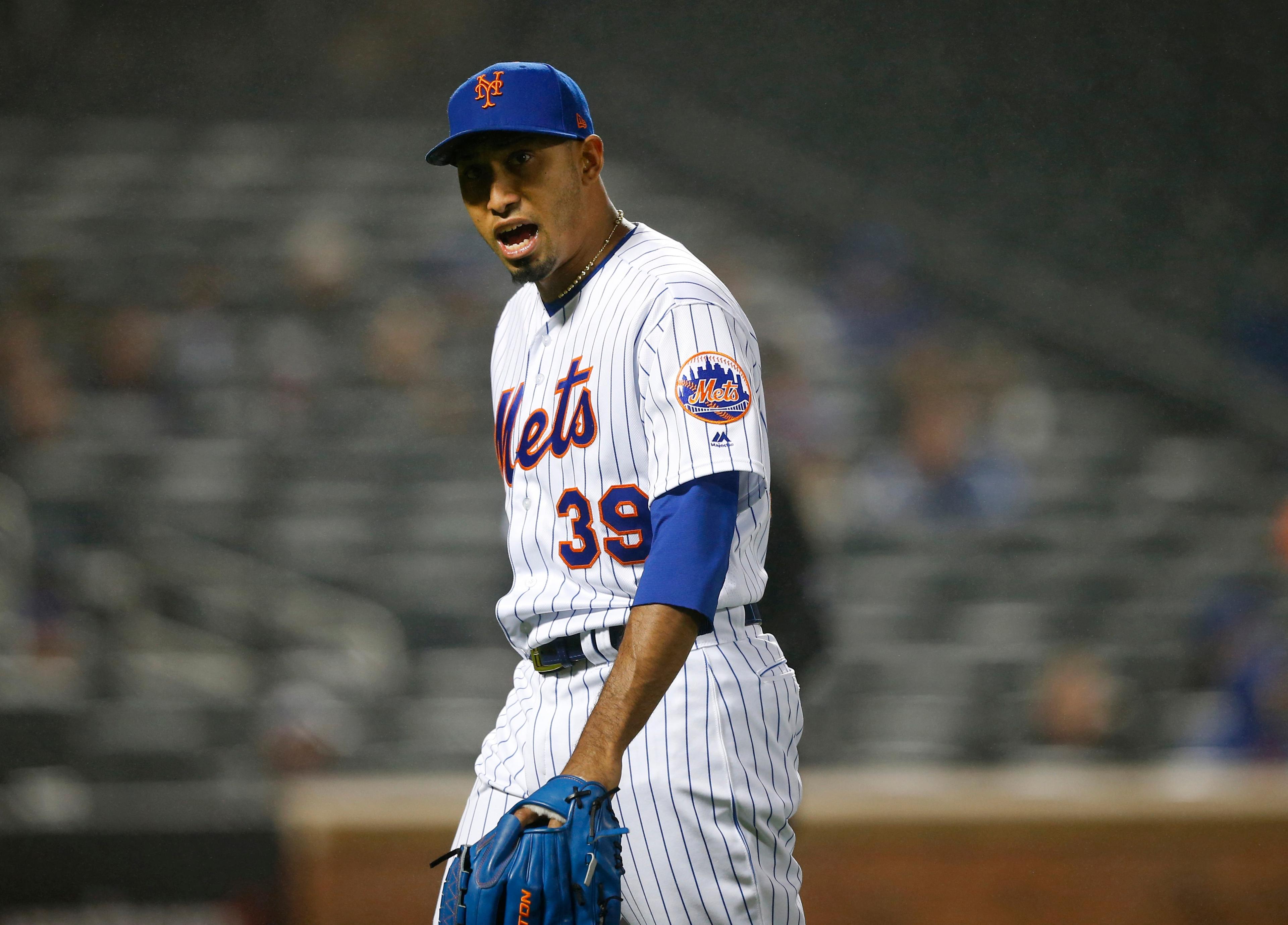 May 1, 2019; New York City, NY, USA; New York Mets relief pitcher Edwin Diaz (39) reacts after giving up a home run in the ninth inning against the Cincinnati Reds at Citi Field. Mandatory Credit: Noah K. Murray-USA TODAY Sports 