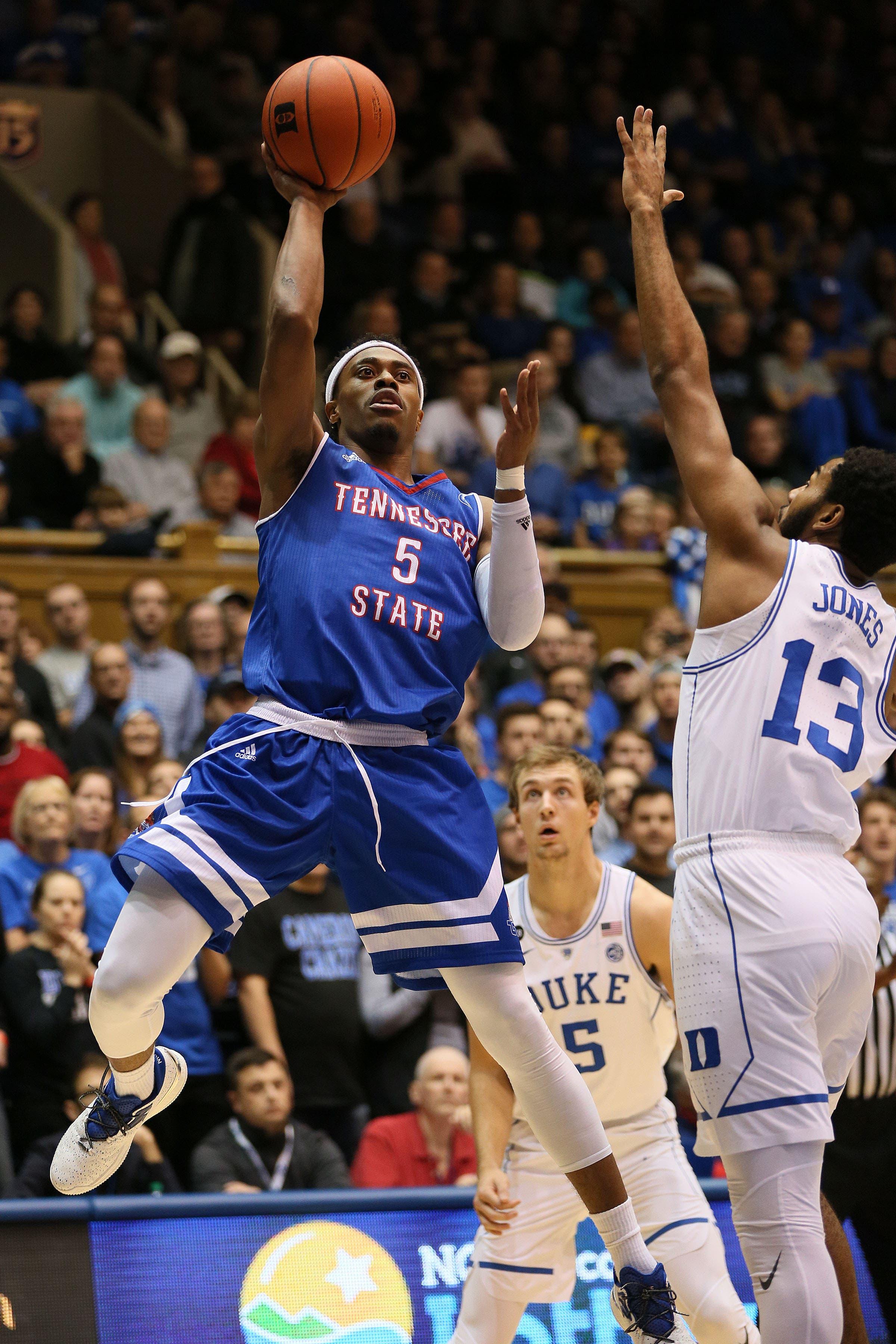 Dec 19, 2016; Durham, NC, USA; Tennessee State Tigers guard Tahjere McCall (5) shoots against Duke Blue Devils guard Matt Jones (13) in the first half of their game at Cameron Indoor Stadium. Mandatory Credit: Mark Dolejs-USA TODAY Sports / Mark Dolejs