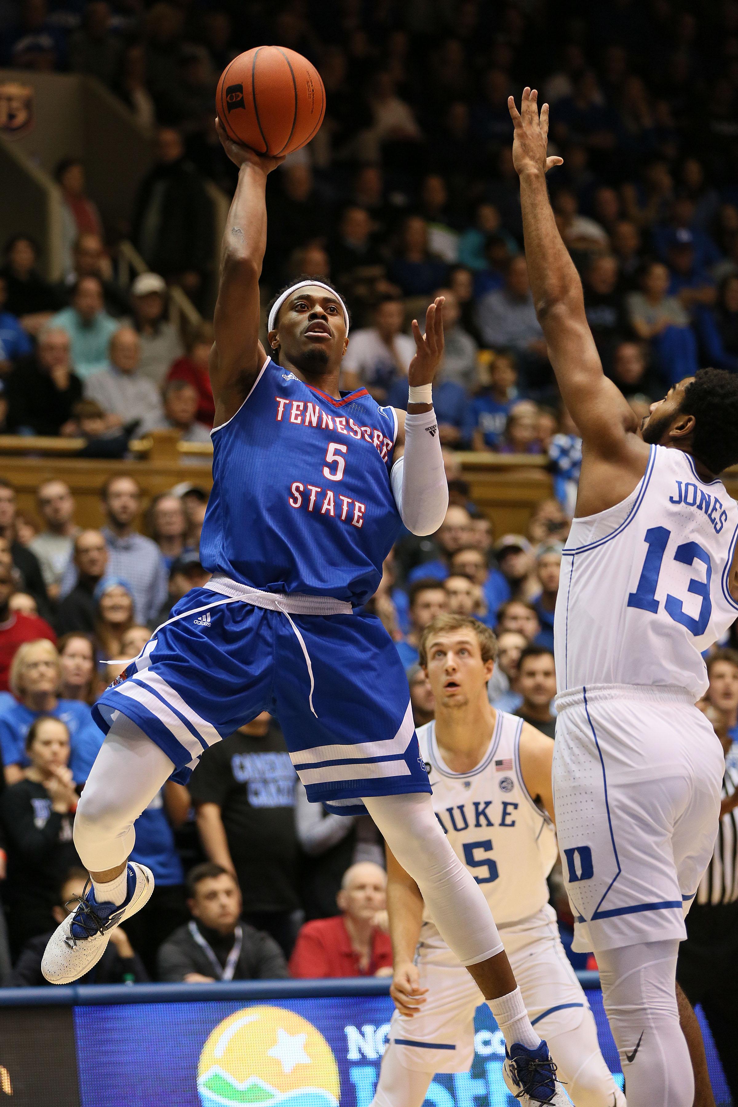 Dec 19, 2016; Durham, NC, USA; Tennessee State Tigers guard Tahjere McCall (5) shoots against Duke Blue Devils guard Matt Jones (13) in the first half of their game at Cameron Indoor Stadium. Mandatory Credit: Mark Dolejs-USA TODAY Sports