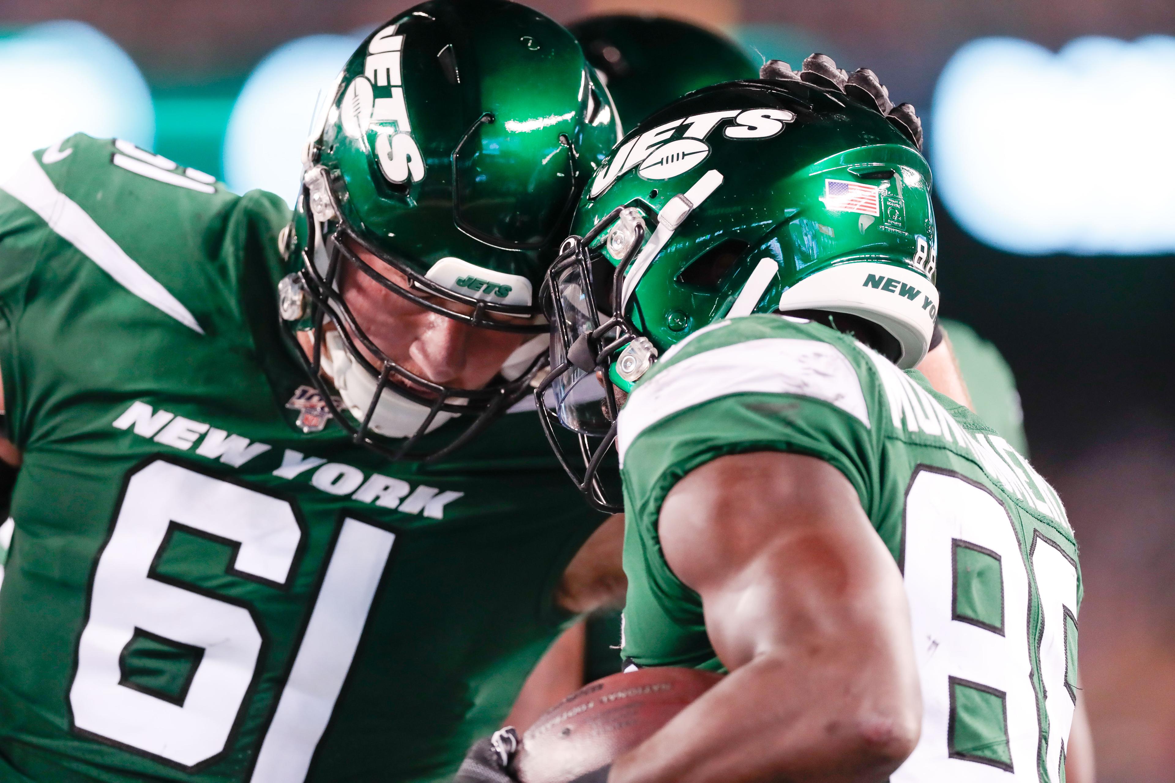 Aug 24, 2019; East Rutherford, NJ, USA; New York Jets running back Ty Montgomery (88) celebrates this touchdown with offensive guard Alex Lewis (61) during the first half at MetLife Stadium. Mandatory Credit: Vincent Carchietta-USA TODAY Sports