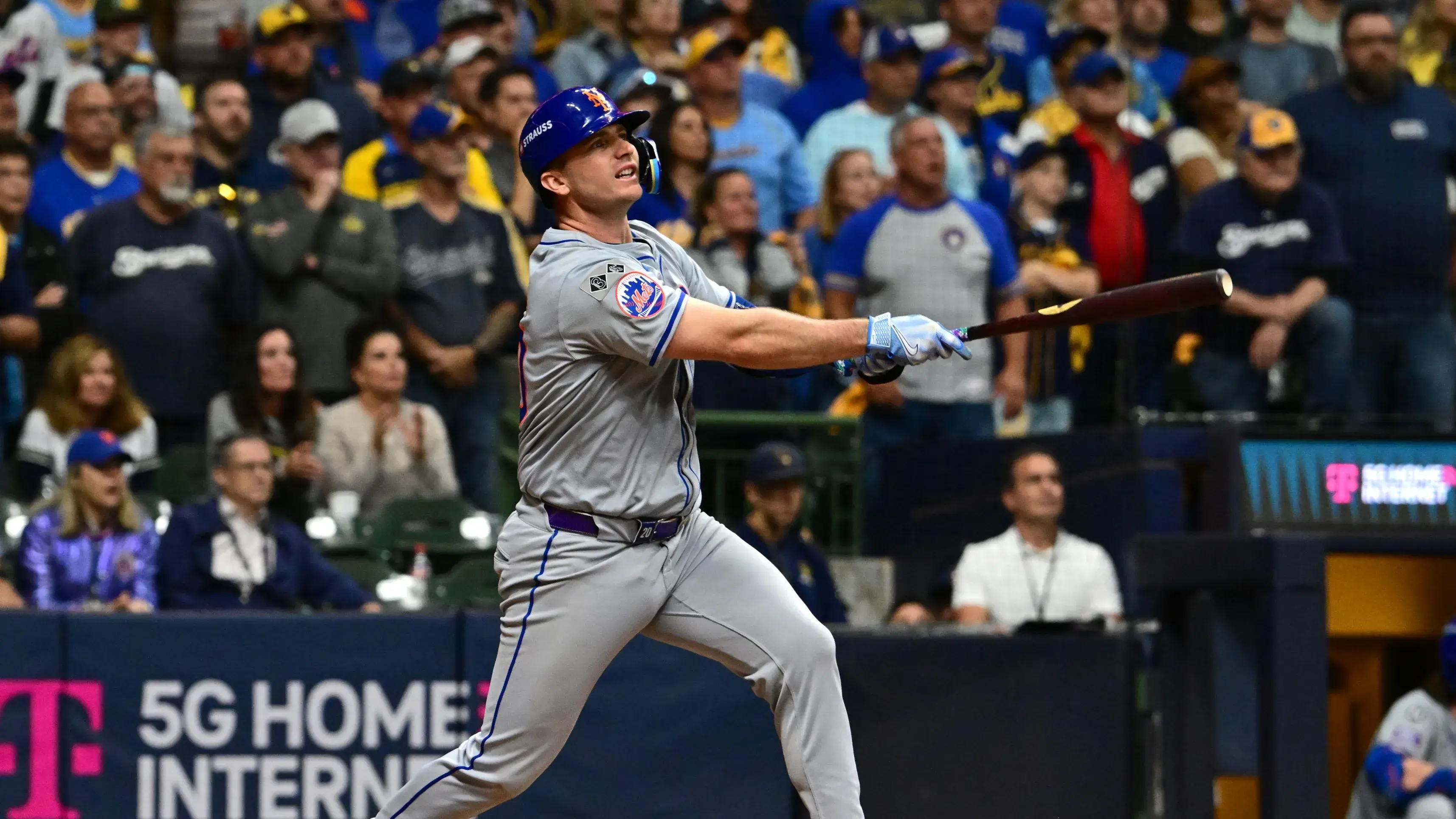 Oct 3, 2024; Milwaukee, Wisconsin, USA; New York Mets first baseman Pete Alonso (20) hits a three run home run against the Milwaukee Brewers in the ninth inning during game three of the Wildcard round for the 2024 MLB Playoffs at American Family Field. Mandatory Credit: Benny Sieu-Imagn Images / © Benny Sieu-Imagn Images