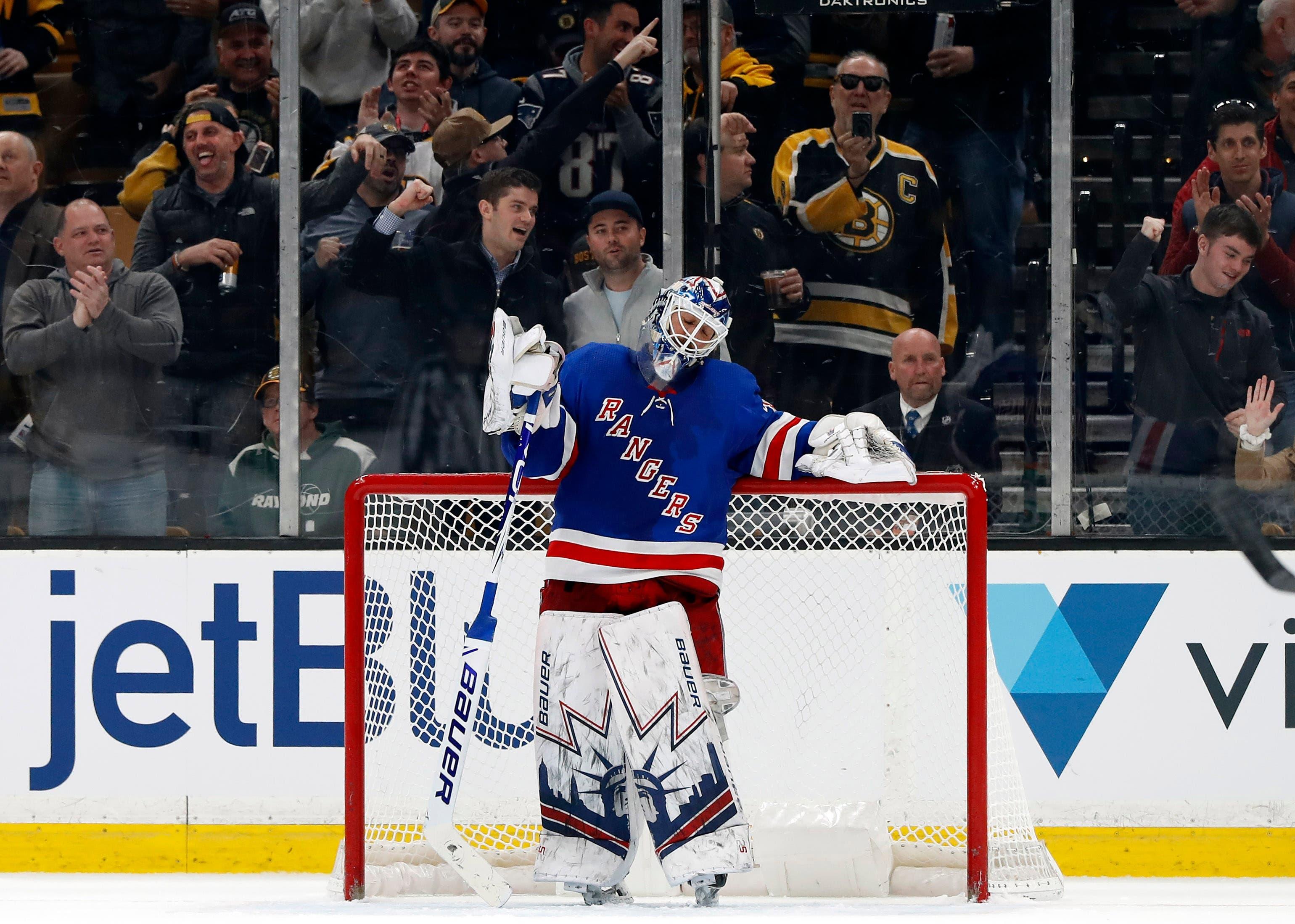 Mar 27, 2019; Boston, MA, USA; Boston Bruins fans cheer after New York Rangers goaltender Henrik Lundqvist (30) gave up a goal during the third period of Boston's 6-3 win at TD Garden. Mandatory Credit: Winslow Townson-USA TODAY Sports / Winslow Townson