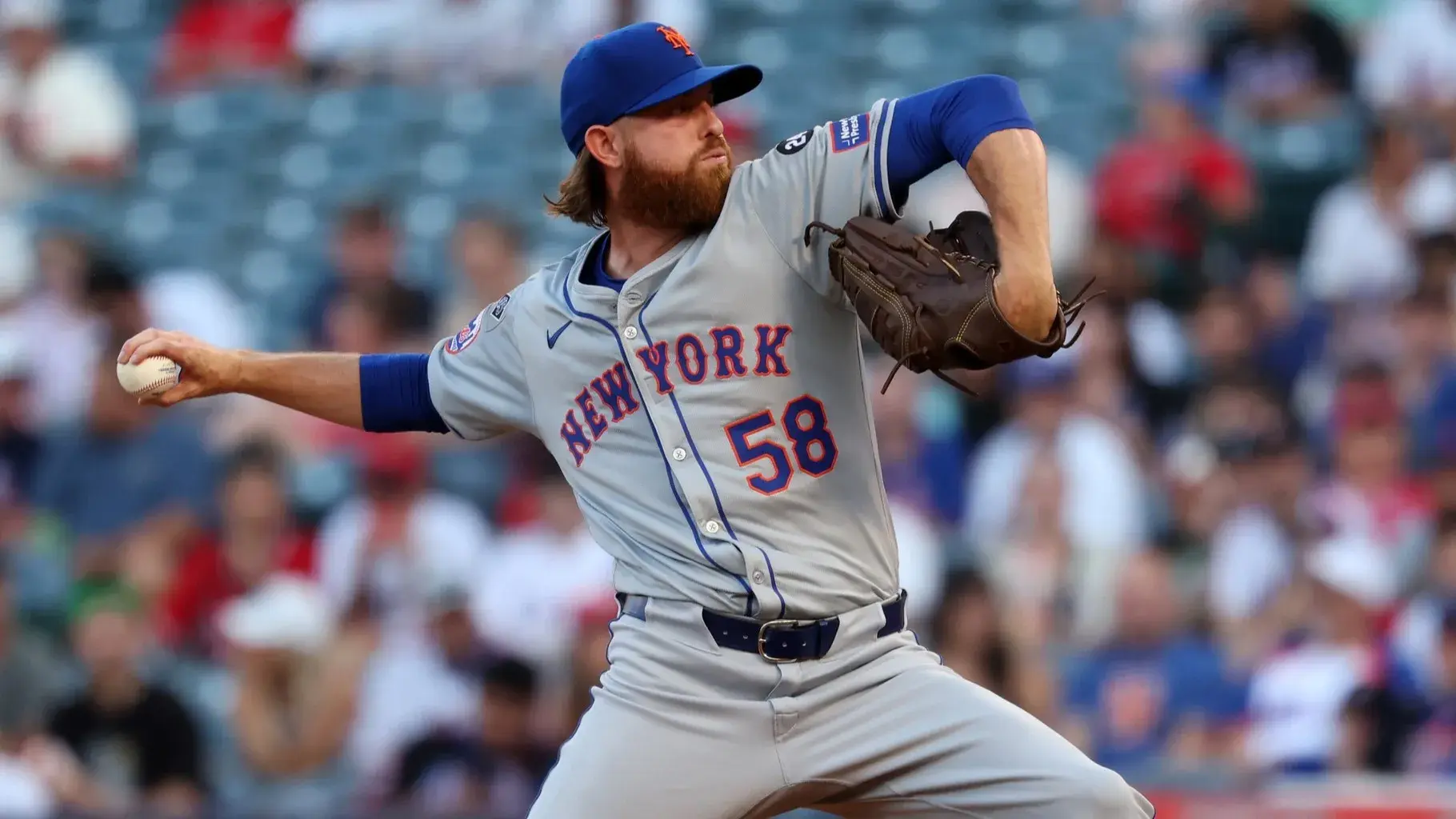 Aug 2, 2024; Anaheim, California, USA; New York Mets starting pitcher Paul Blackburn (58) pitches during the first inning against the Los Angeles Angels at Angel Stadium. / Kiyoshi Mio-USA TODAY Sports