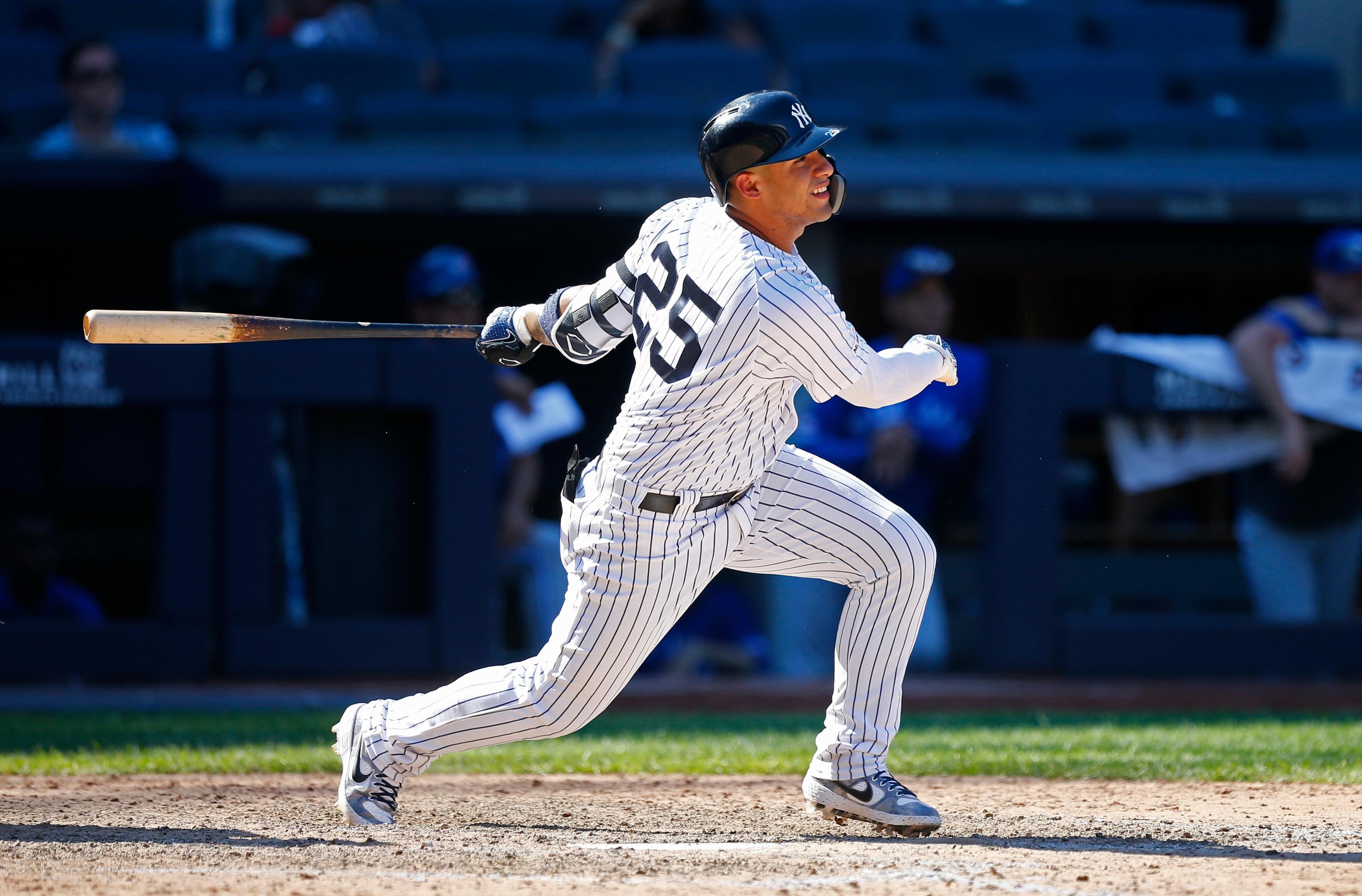 Jun 26, 2019; Bronx, NY, USA; New York Yankees second baseman Gleyber Torres (25) follows through on a walk off RBI single against the Toronto Blue Jays in the ninth inning at Yankee Stadium. Mandatory Credit: Noah K. Murray-USA TODAY Sports / Noah K. Murray