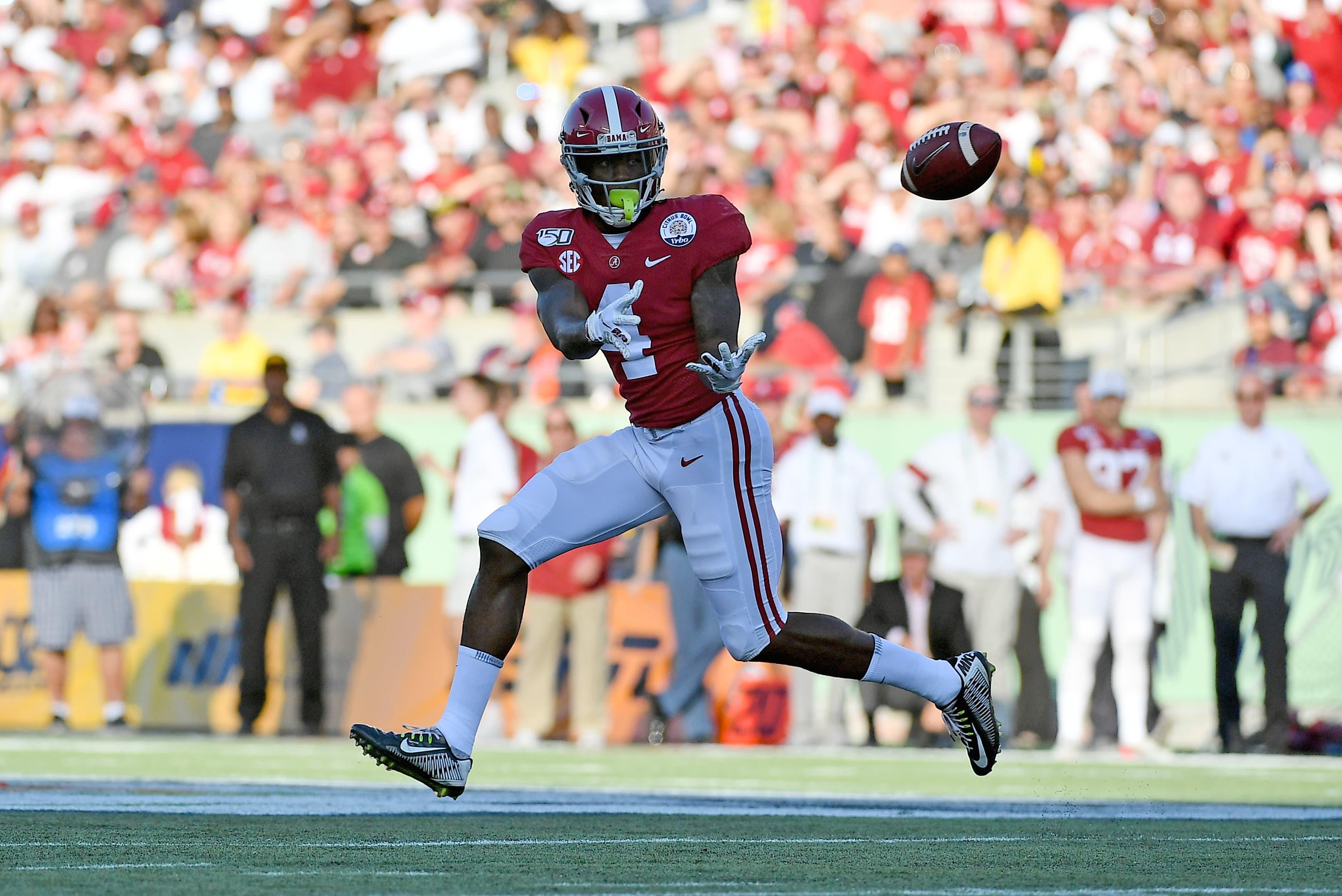 Jan 1, 2020; Orlando, Florida, USA; Alabama Crimson Tide wide receiver Jerry Jeudy (4) makes a catch against the Michigan Wolverines during the second half at Camping World Stadium. Mandatory Credit: Jasen Vinlove-USA TODAY Sports / Jasen Vinlove