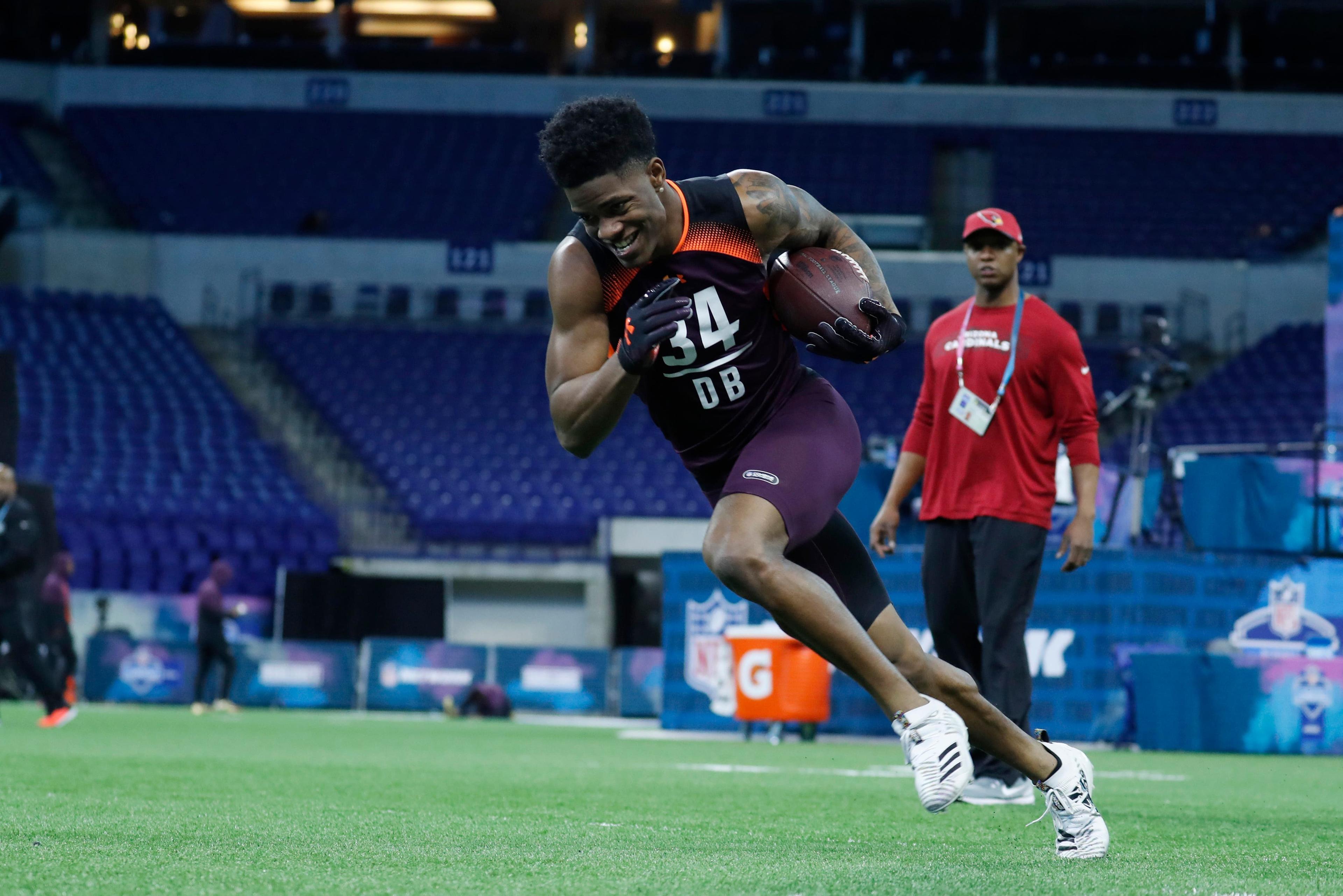 Mar 4, 2019; Indianapolis, IN, USA; Louisiana State defensive back Greedy Williams (DB34) goes through workout drills during the 2019 NFL Combine at Lucas Oil Stadium. Mandatory Credit: Brian Spurlock-USA TODAY Sports / Brian Spurlock