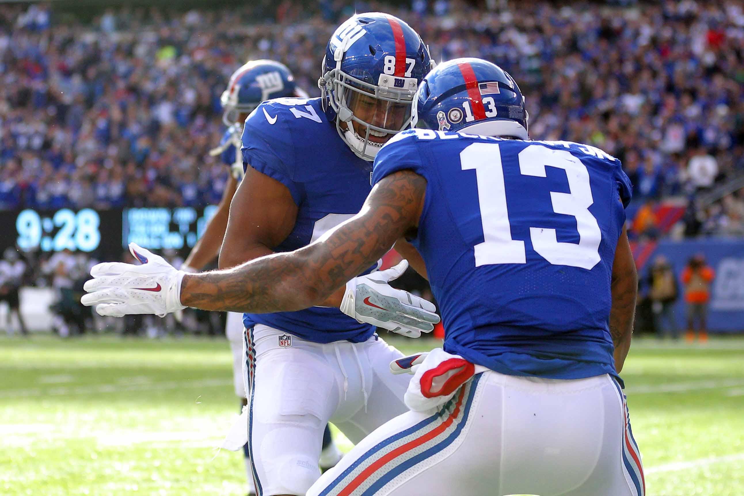 Nov 6, 2016; East Rutherford, NJ, USA; New York Giants wide receiver Odell Beckham Jr. (13) celebrates his touchdown catch against the Philadelphia Eagles with New York Giants wide receiver Sterling Shepard (87) during the second quarter at MetLife Stadium. Mandatory Credit: Brad Penner-USA TODAY Sports / Brad Penner