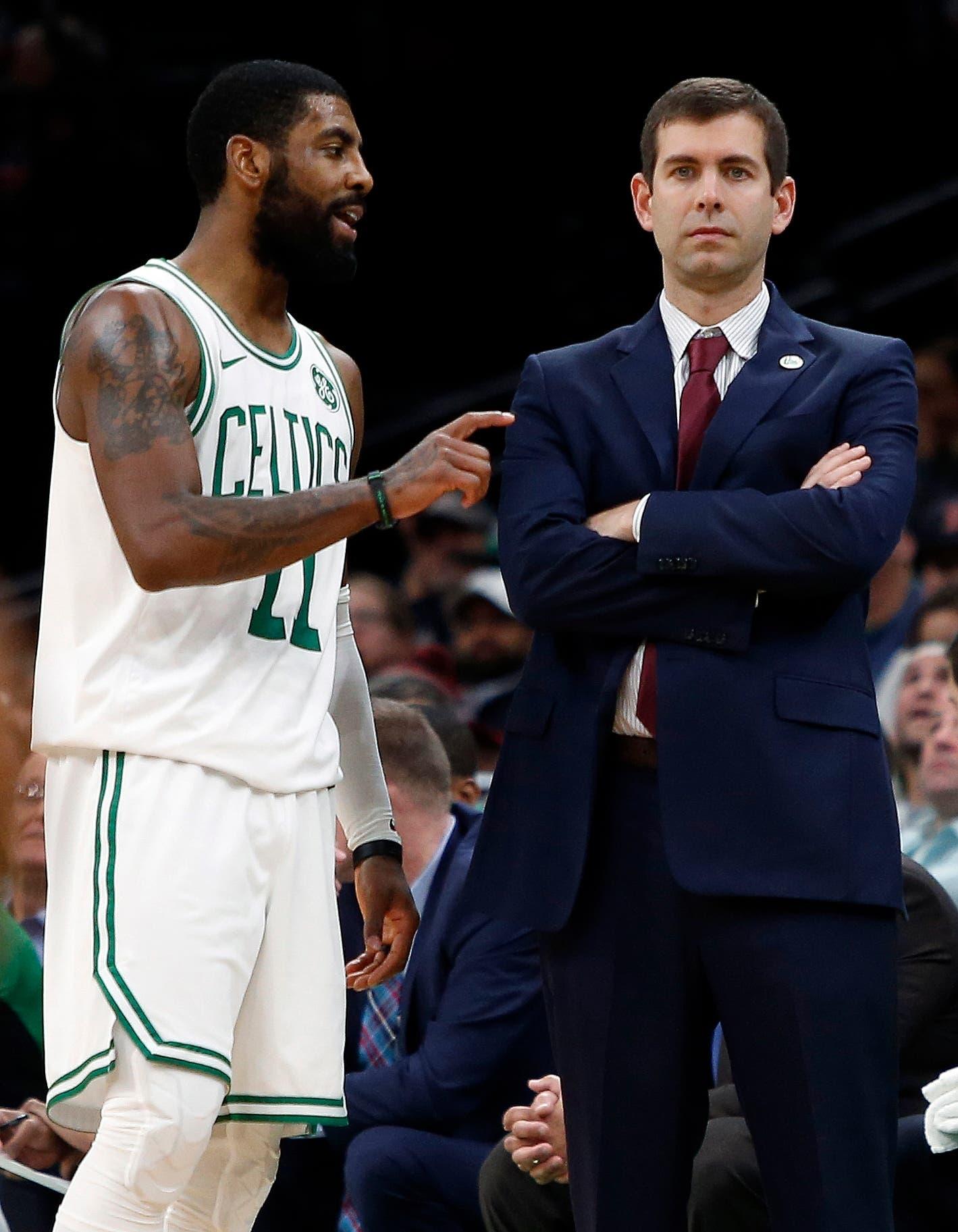 Dec 19, 2018; Boston, MA, USA; Boston Celtics guard Kyrie Irving (11) talks with head coach Brad Stevens during the second half against the Phoenix Suns at TD Garden. Mandatory Credit: Winslow Townson-USA TODAY Sports / Winslow Townson