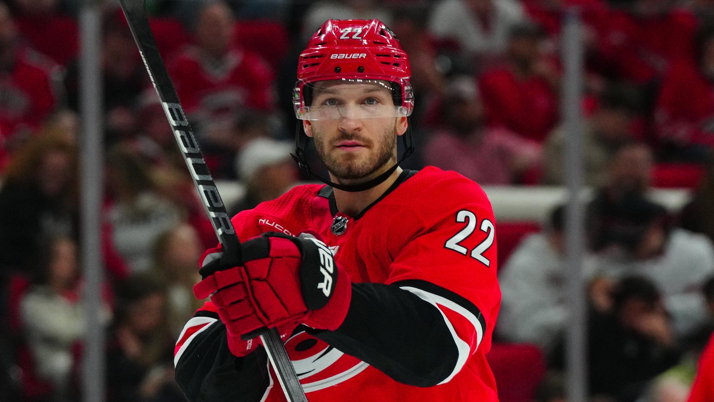 Carolina Hurricanes defenseman Brett Pesce (22) looks on against the Detroit Red Wings during the second period at PNC Arena. / James Guillory - USA TODAY Sports