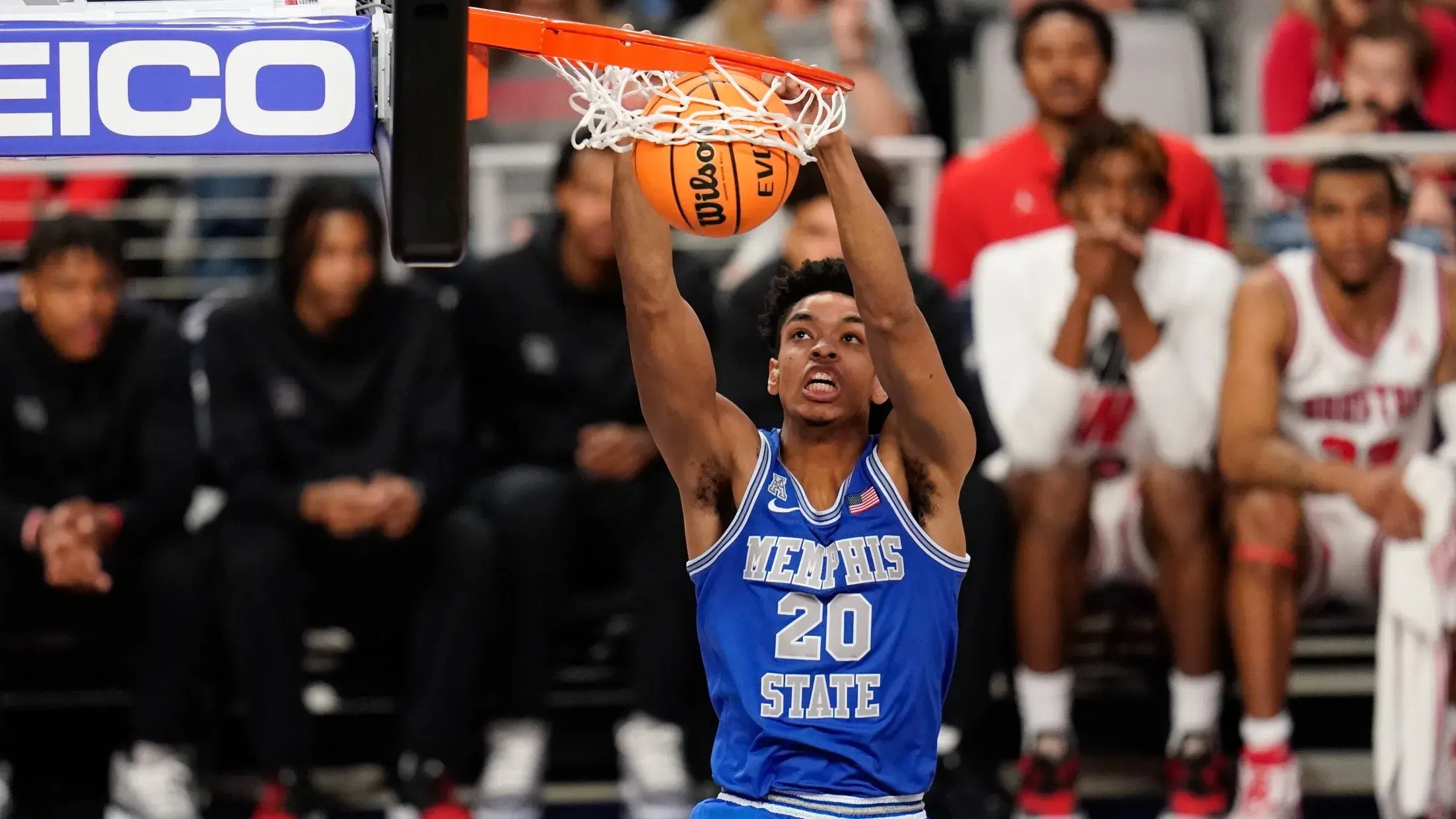 Mar 13, 2022; Fort Worth, TX, USA; Memphis Tigers forward Josh Minott (20) dunks the ball against the Houston Cougars during the first half at Dickies Arena. / Chris Jones-USA TODAY Sports