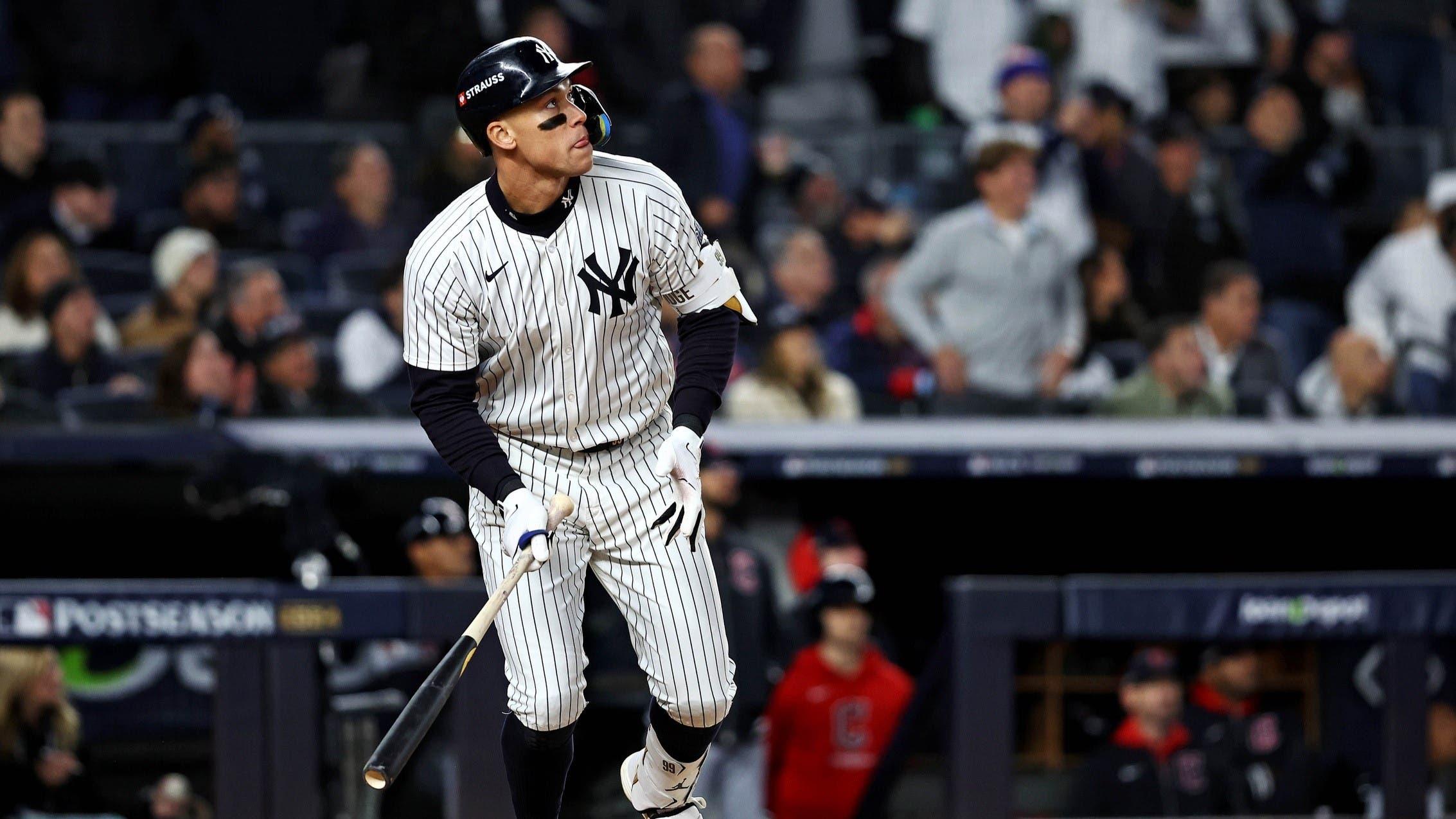 Oct 15, 2024; Bronx, New York, USA; New York Yankees outfielder Aaron Judge (99) hits a two run home run during the seventh inning against the Cleveland Guardians in game two of the ALCS for the 2024 MLB Playoffs at Yankee Stadium. / Wendell Cruz-Imagn Images