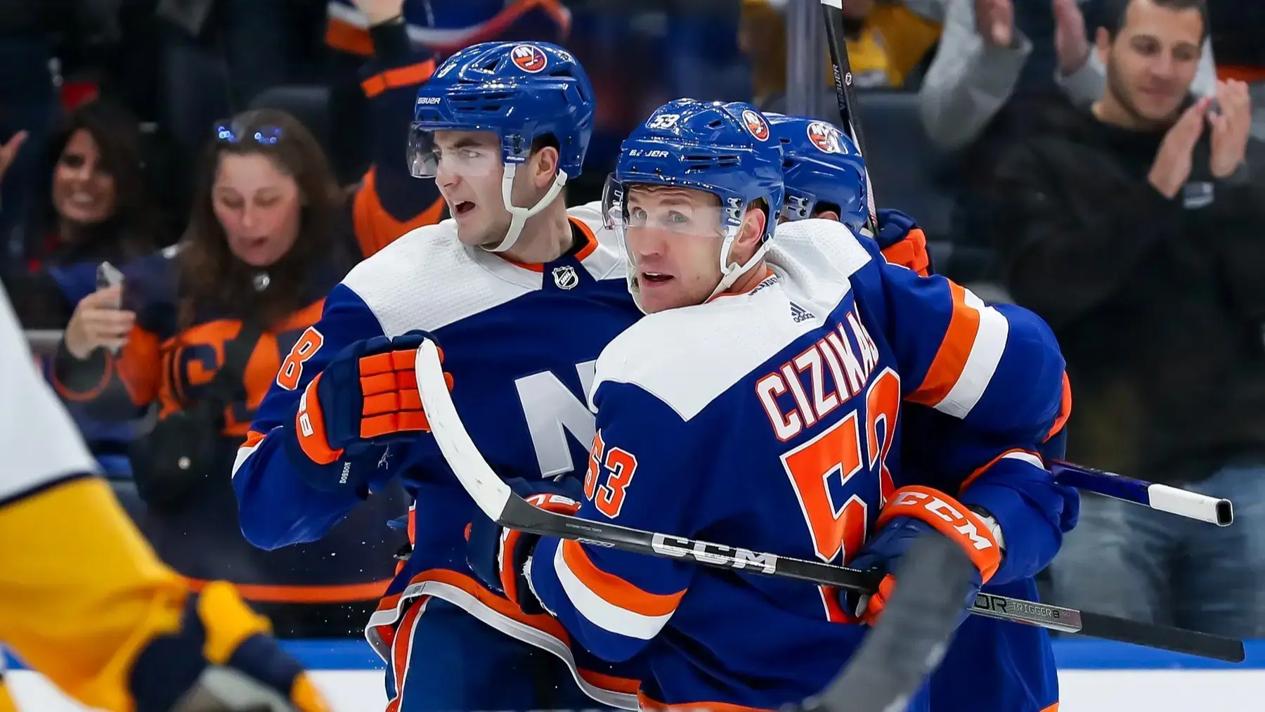 Apr 6, 2024; Elmont, New York, USA; New York Islanders defenseman Noah Dobson (8) celebrates with center Casey Cizikas (53) after scoring a goal against the Nashville Predators during the second period at UBS Arena. / Tom Horak-USA TODAY Sports