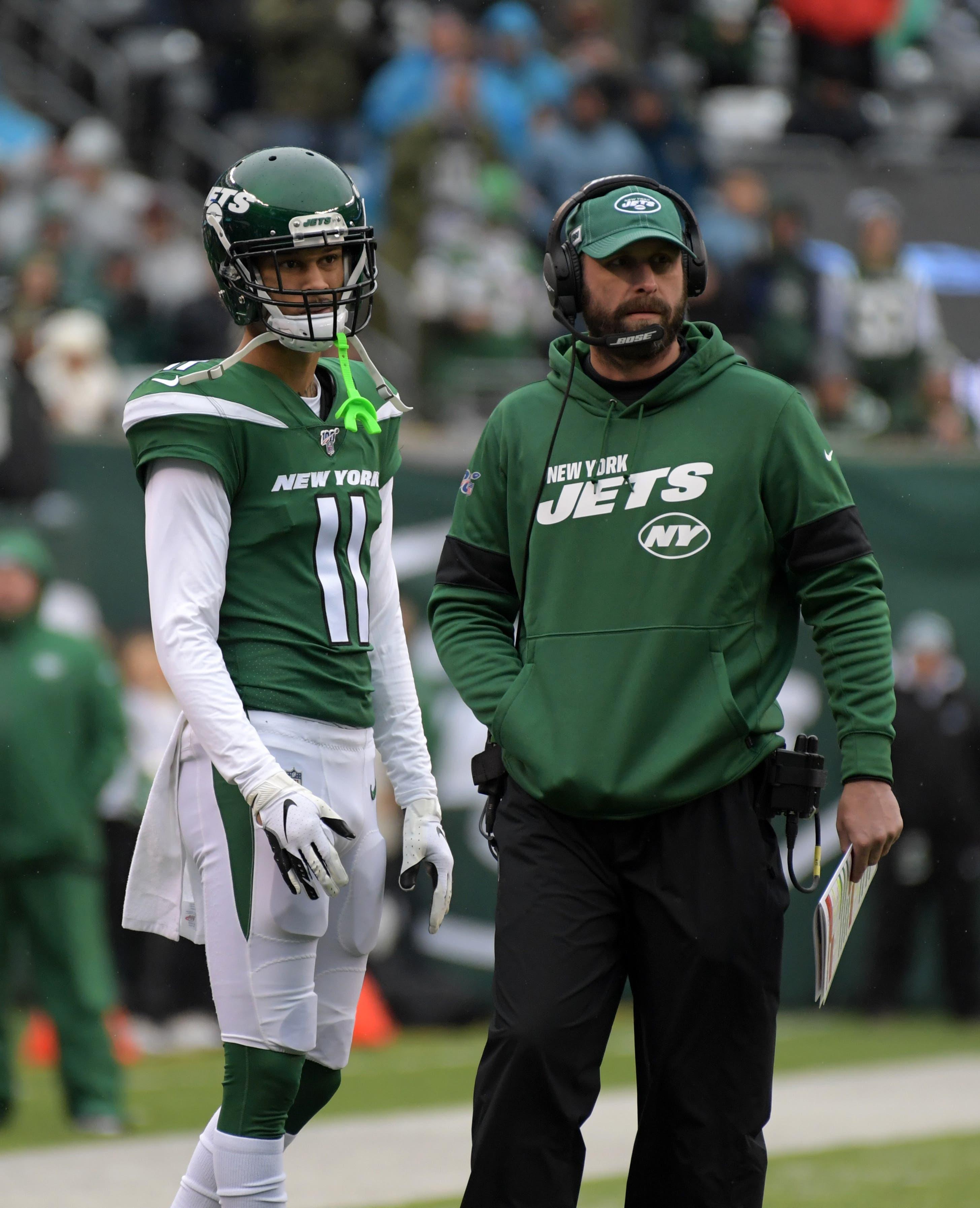 Nov 24, 2019; East Rutherford, NJ, USA; New York Jets head coach Adam Gase and wide receiver Robby Anderson (11) watch from the sidelines in the second quarter against the Oakland Raiders at MetLife Stadium. The Jets defeated the Raiders 34-3. Mandatory Credit: Kirby Lee-USA TODAY Sports / Kirby Lee