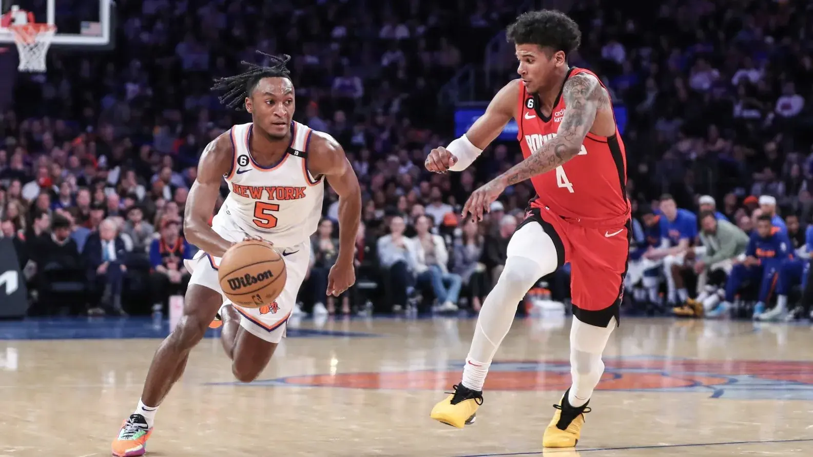 New York Knicks guard Immanuel Quickley (5) looks to drive past Houston Rockets guard Jalen Green (4) in the third quarter at Madison Square Garden / Wendell Cruz-USA TODAY Sports