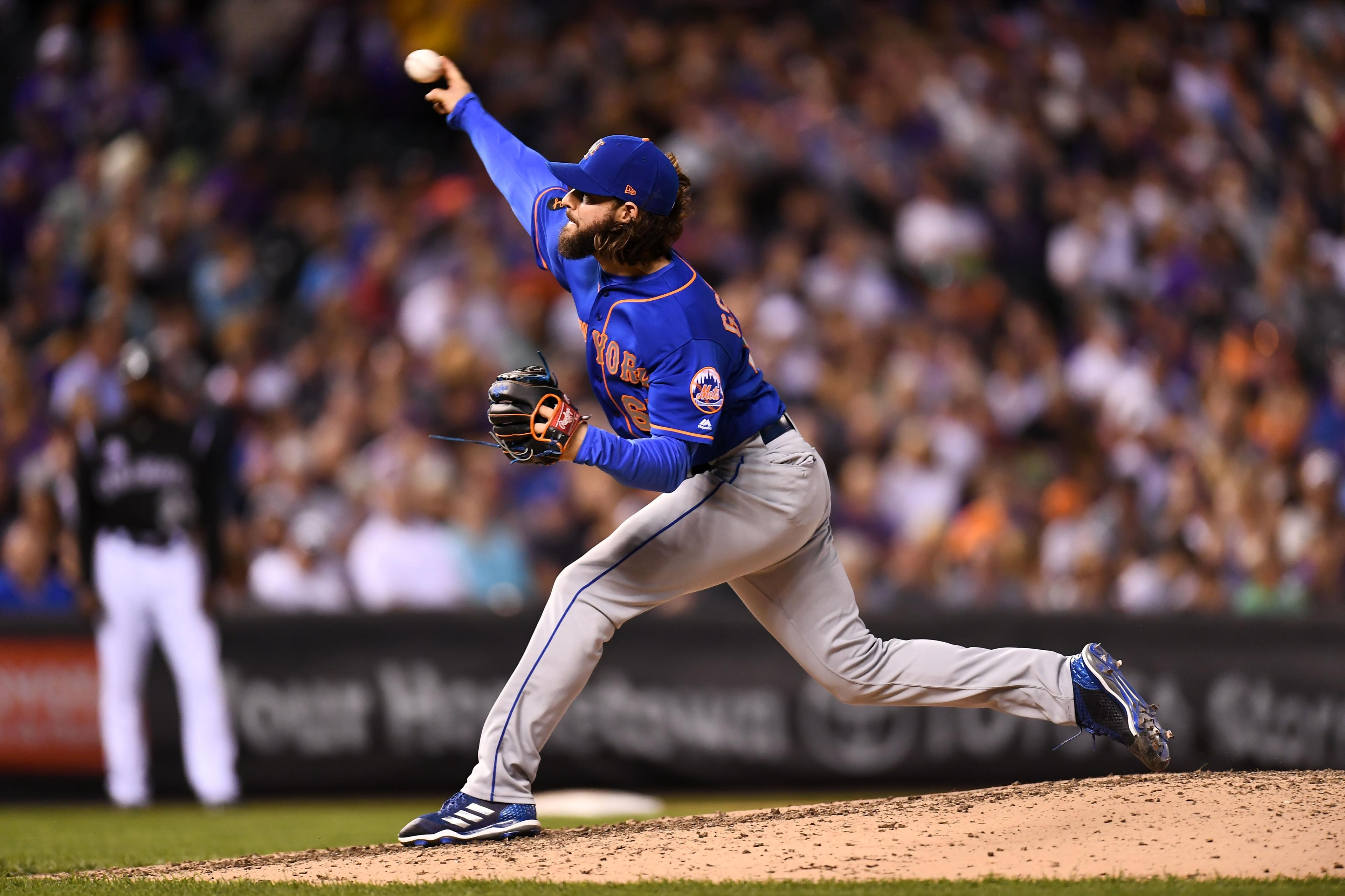 May 31, 2019; Phoenix, AZ, USA; New York Mets relief pitcher Robert Gsellman (65) and catcher Wilson Ramos (40) celebrate after the ninth inning against the Arizona Diamondbacks at Chase Field. Mandatory Credit: Joe Camporeale-USA TODAY Sports