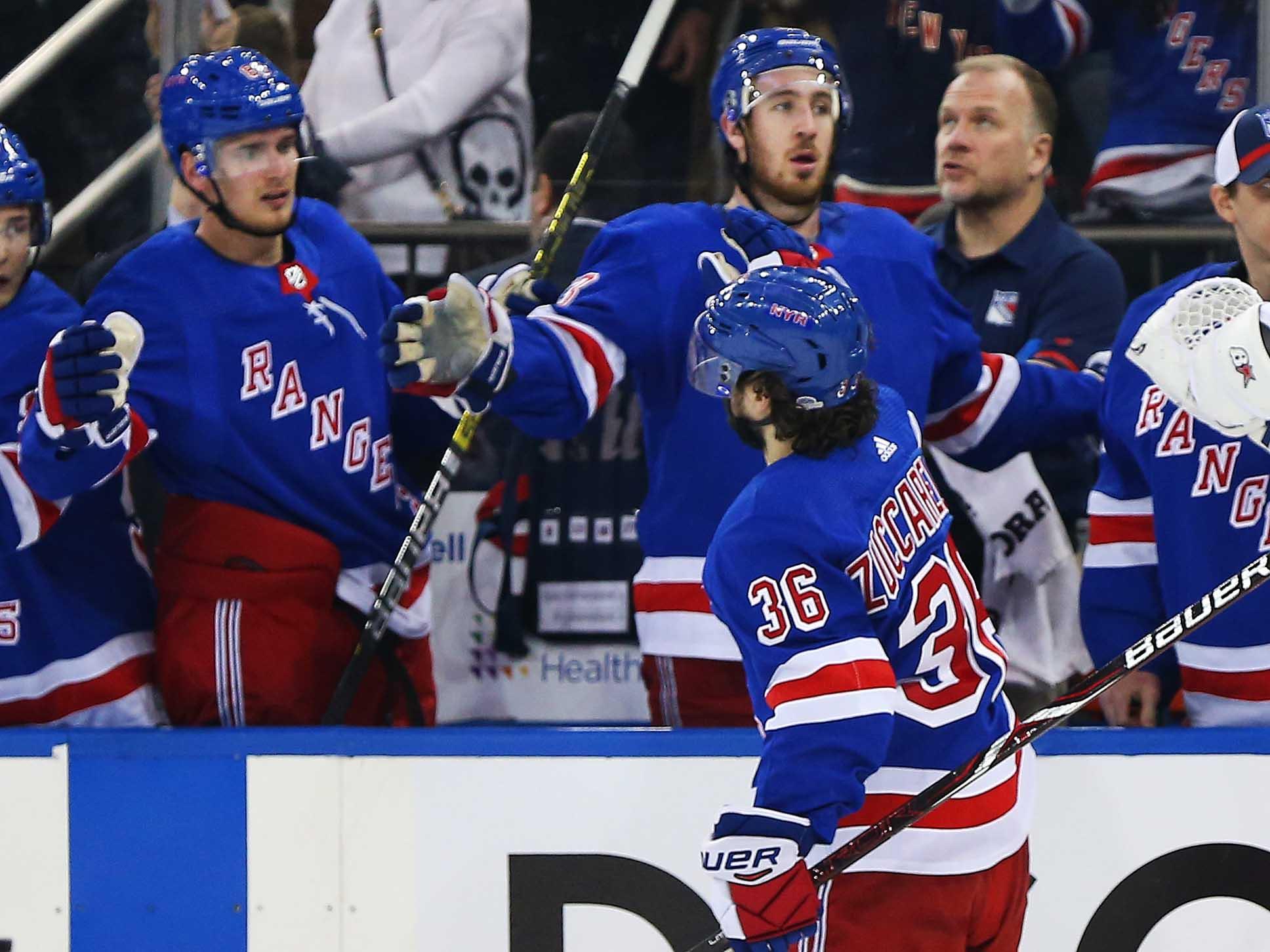 Feb 2, 2019; New York, NY, USA; New York Rangers right wing Mats Zuccarello (36) is congratulated after scoring a goal against the Tampa Bay Lightning during the second period at Madison Square Garden. Mandatory Credit: Andy Marlin-USA TODAY Sports / Andy Marlin