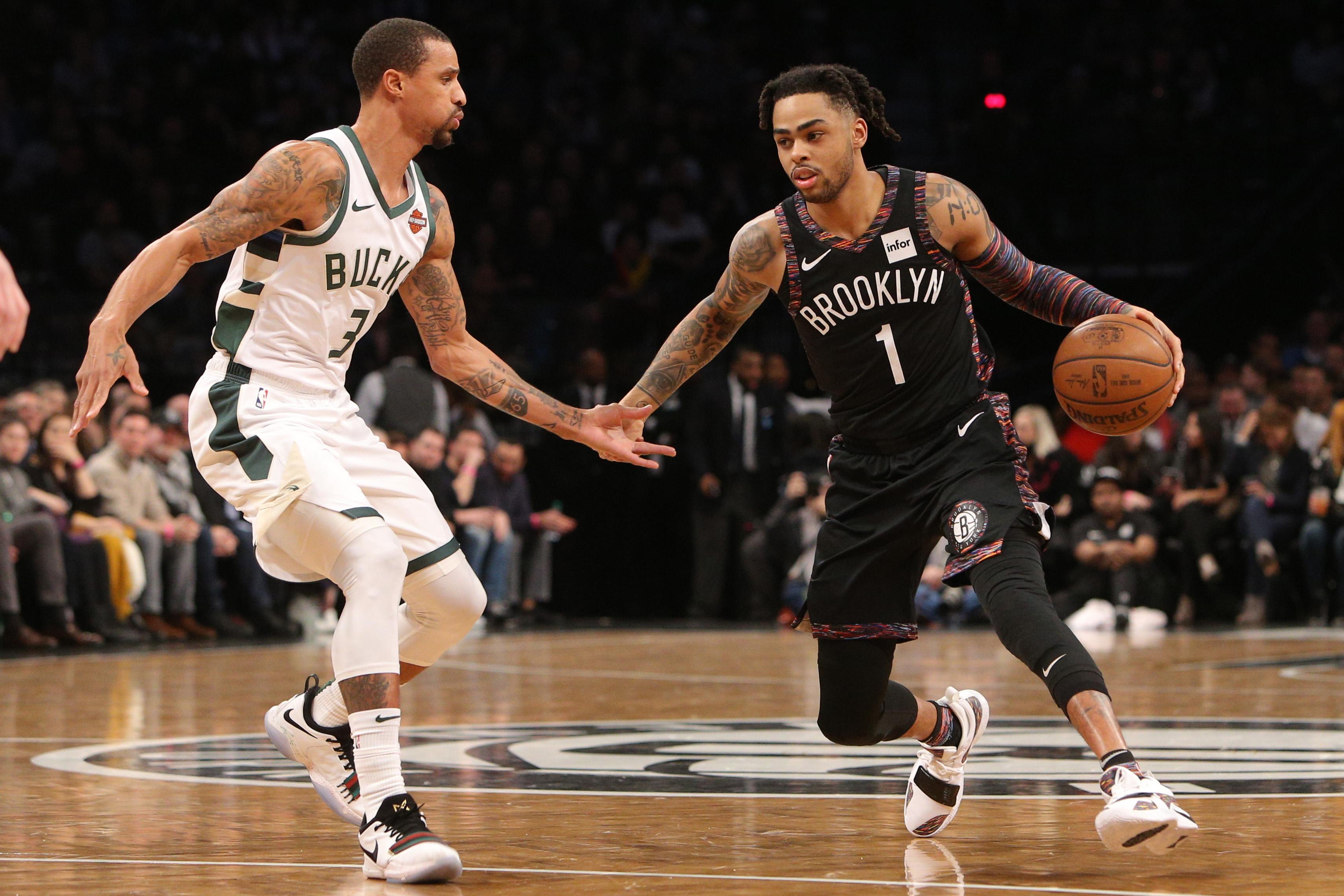 Feb 4, 2019; Brooklyn, NY, USA; Brooklyn Nets point guard D'Angelo Russell (1) controls the ball against Milwaukee Bucks guard George Hill (3) during the first quarter at Barclays Center. Mandatory Credit: Brad Penner-USA TODAY Sports