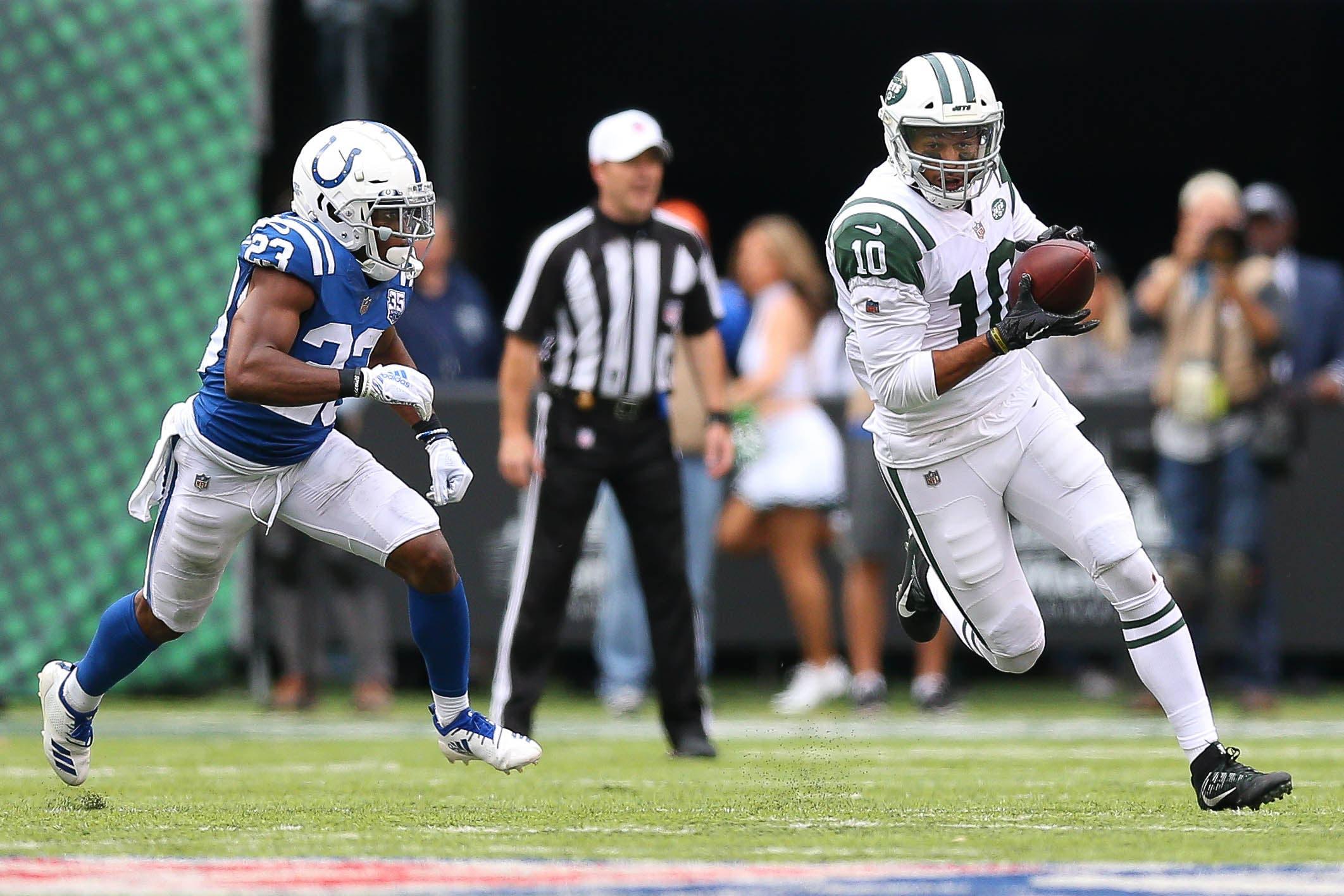 Oct 14, 2018; East Rutherford, NJ, USA; New York Jets wide receiver Jermaine Kearse (10) rushes for yards after a catch as Indianapolis Colts cornerback Kenny Moore (23) pursues during the second half at MetLife Stadium. Mandatory Credit: Vincent Carchietta-USA TODAY Sports / Vincent Carchietta