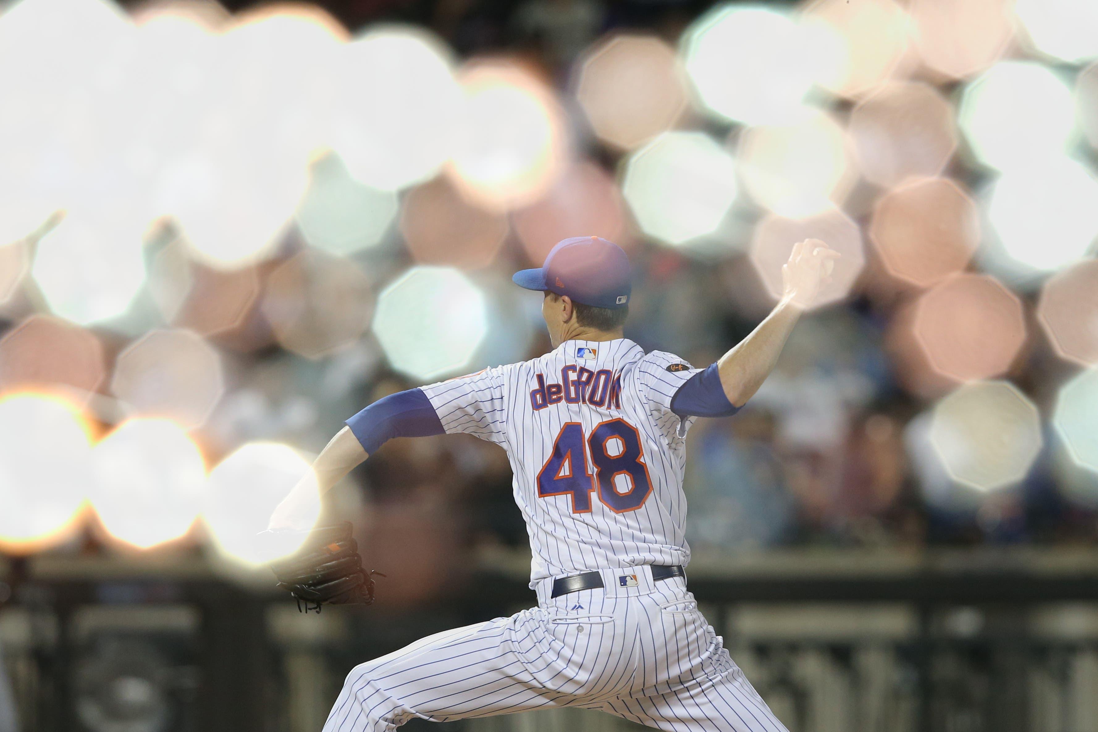 Sep 26, 2018; New York City, NY, USA; New York Mets starting pitcher Jacob deGrom (48) pitches against the Atlanta Braves during the seventh inning at Citi Field. Mandatory Credit: Brad Penner-USA TODAY Sports / Brad Penner