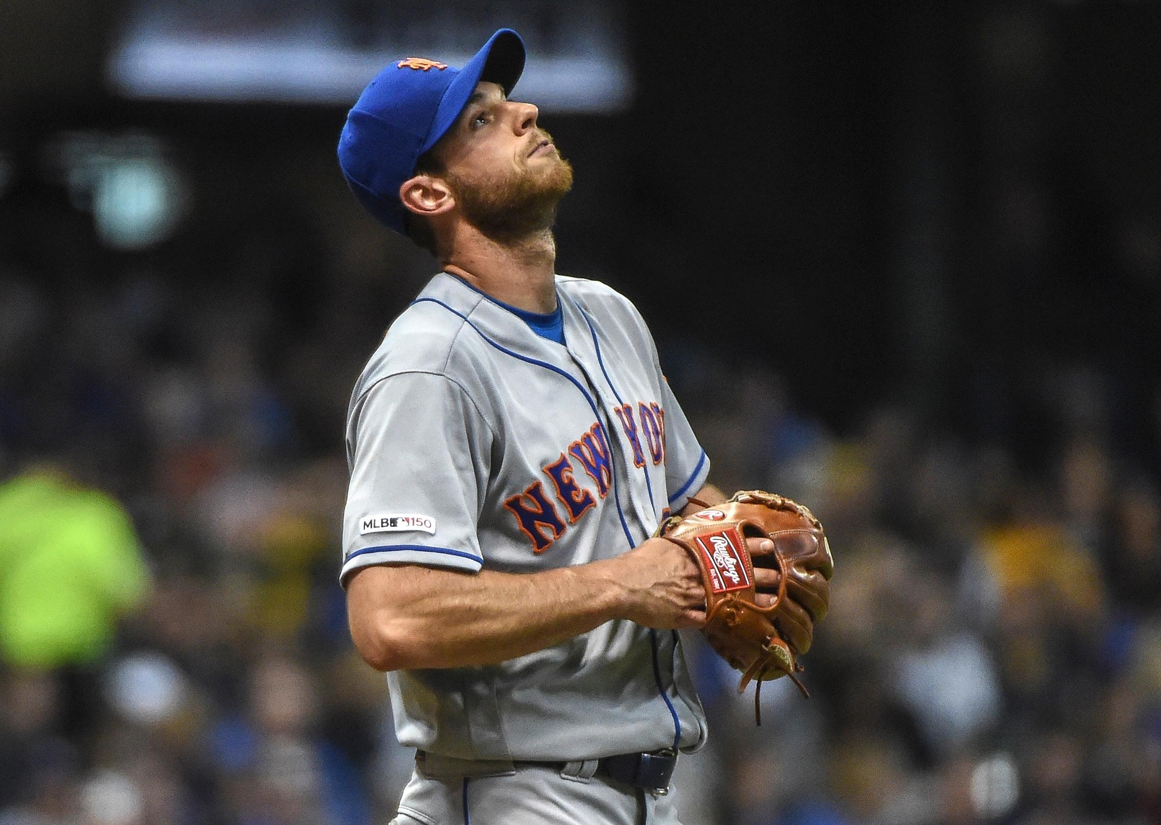 New York Mets pitcher Steven Matz reacts after giving up a hit in the fifth inning against the Milwaukee Brewers at Miller Park.