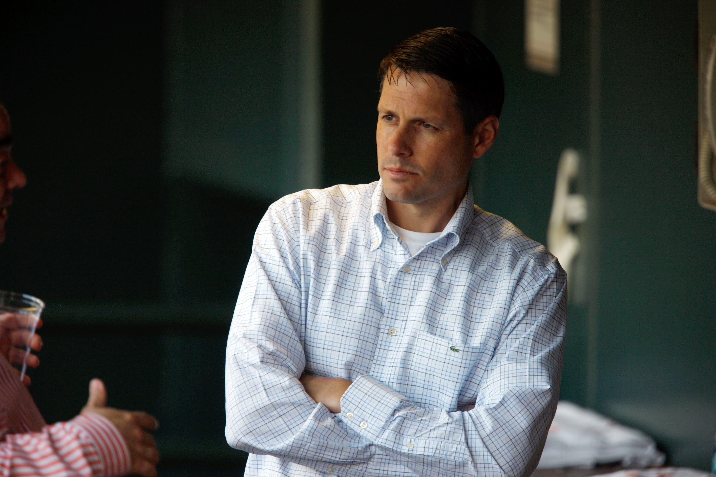 New York Mets assistant general manager John Ricco looks on before facing the Colorado Rockies in the first inning of a baseball game in Denver on Wednesday, Sept. 2, 2009. (AP Photo/David Zalubowski) / David Zalubowski/AP