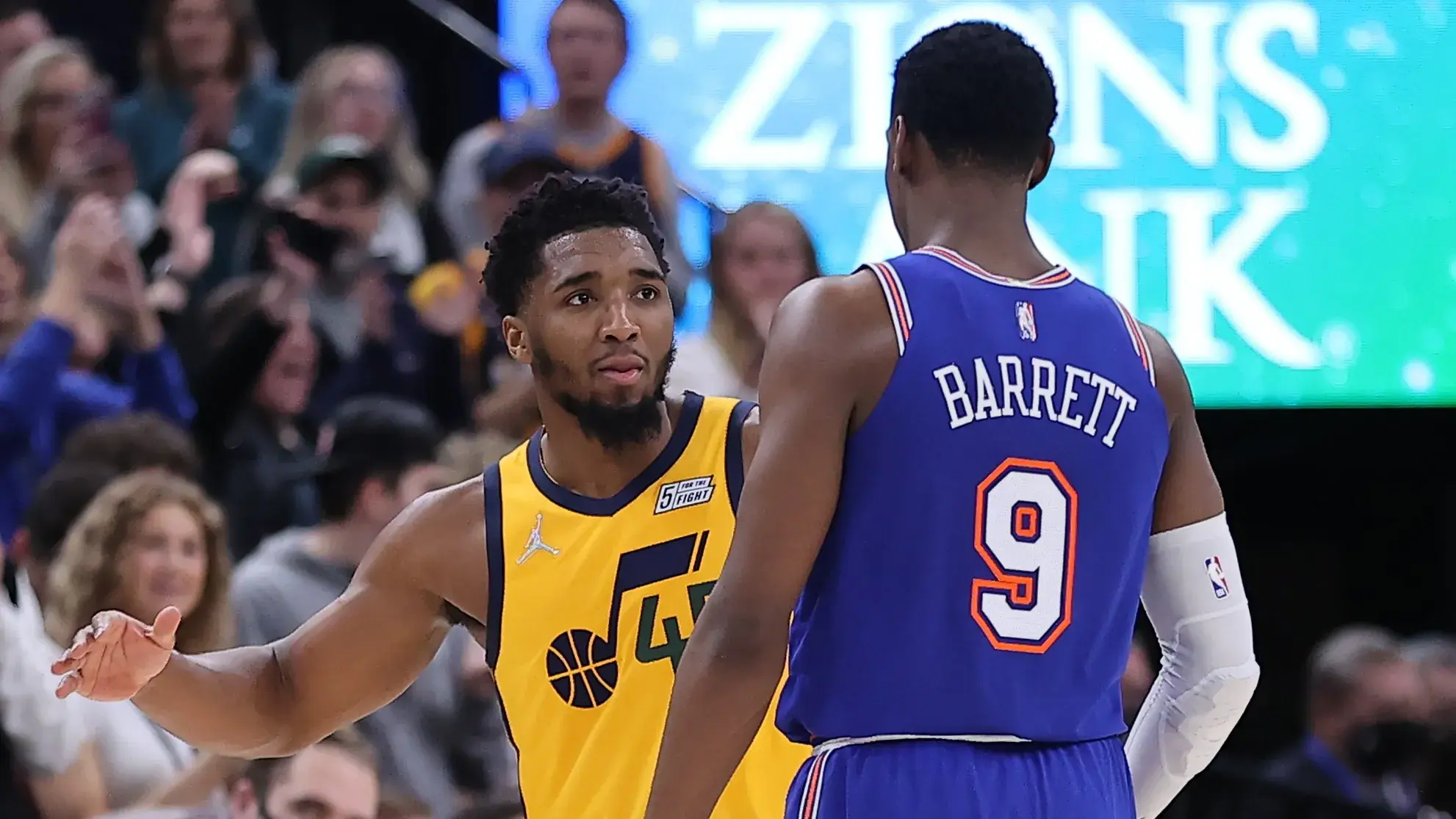 Feb 7, 2022; Salt Lake City, Utah, USA; Utah Jazz guard Donovan Mitchell (45) and New York Knicks guard RJ Barrett (9) shake hands at the end of the game at Vivint Arena. Mandatory Credit: Rob Gray-USA TODAY Sports / Rob Gray-USA TODAY Sports