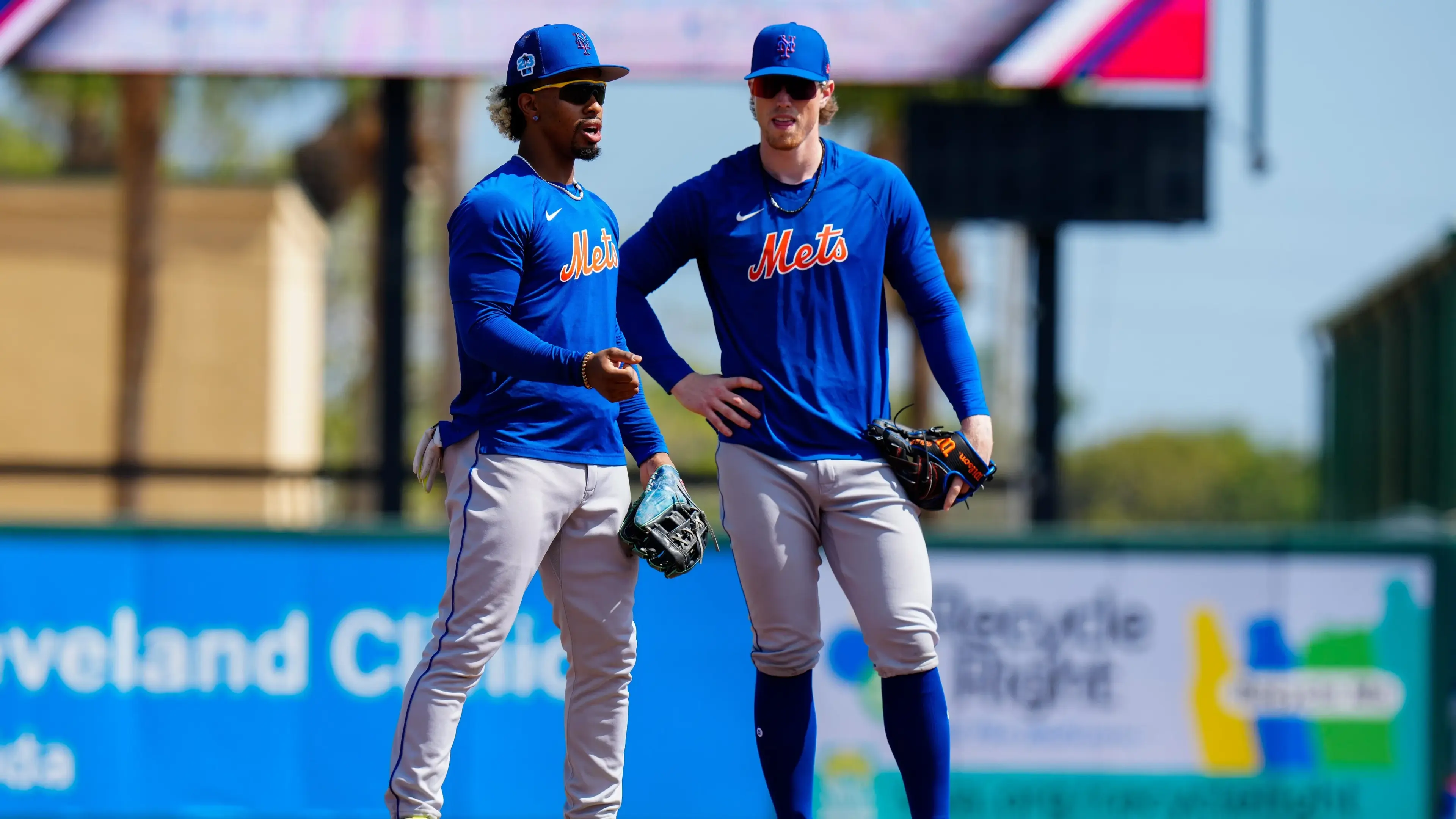 Feb 27, 2023; Jupiter, Florida, USA; New York Mets shortstop Francisco Lindor (12) and third baseman Brett Baty (22) warm up prior to a game against the St. Louis Cardinals at Roger Dean Stadium. / Rich Storry-USA TODAY Sports