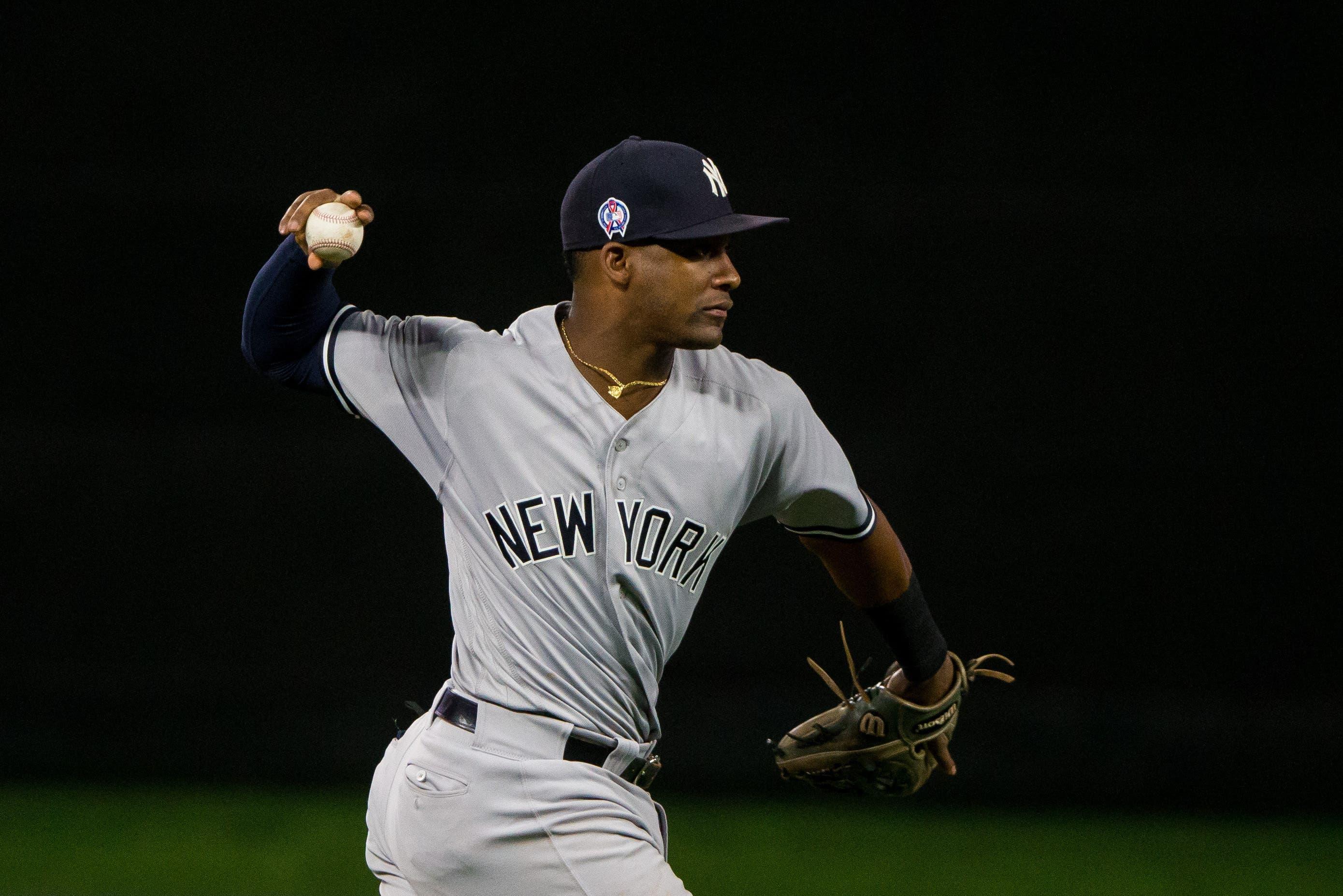 New York Yankees third baseman Miguel Andujar throws to first base in the fourth inning against Minnesota Twins at Target Field. / Brad Rempel/USA TODAY Sports