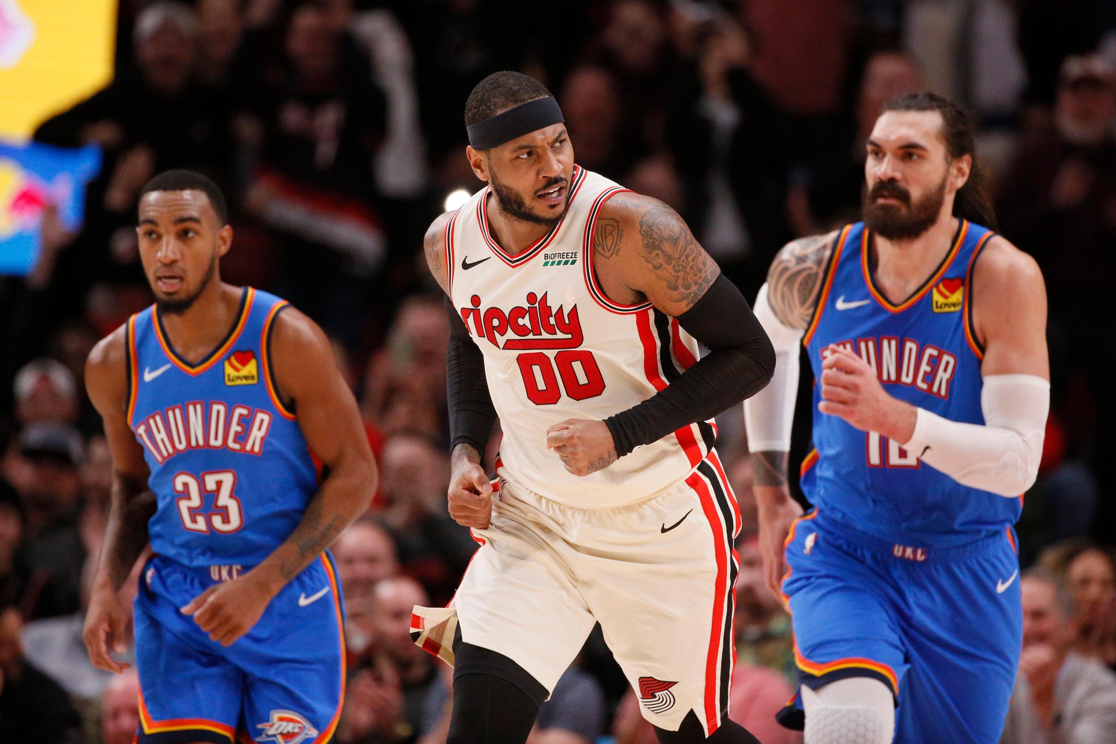 Nov 27, 2019; Portland, OR, USA; Portland Trail Blazers power forward Carmelo Anthony (00) reacts after his dunks against the Oklahoma City Thunder during the second half at Moda Center. Mandatory Credit: Soobum Im-USA TODAY Sports / Soobum Im