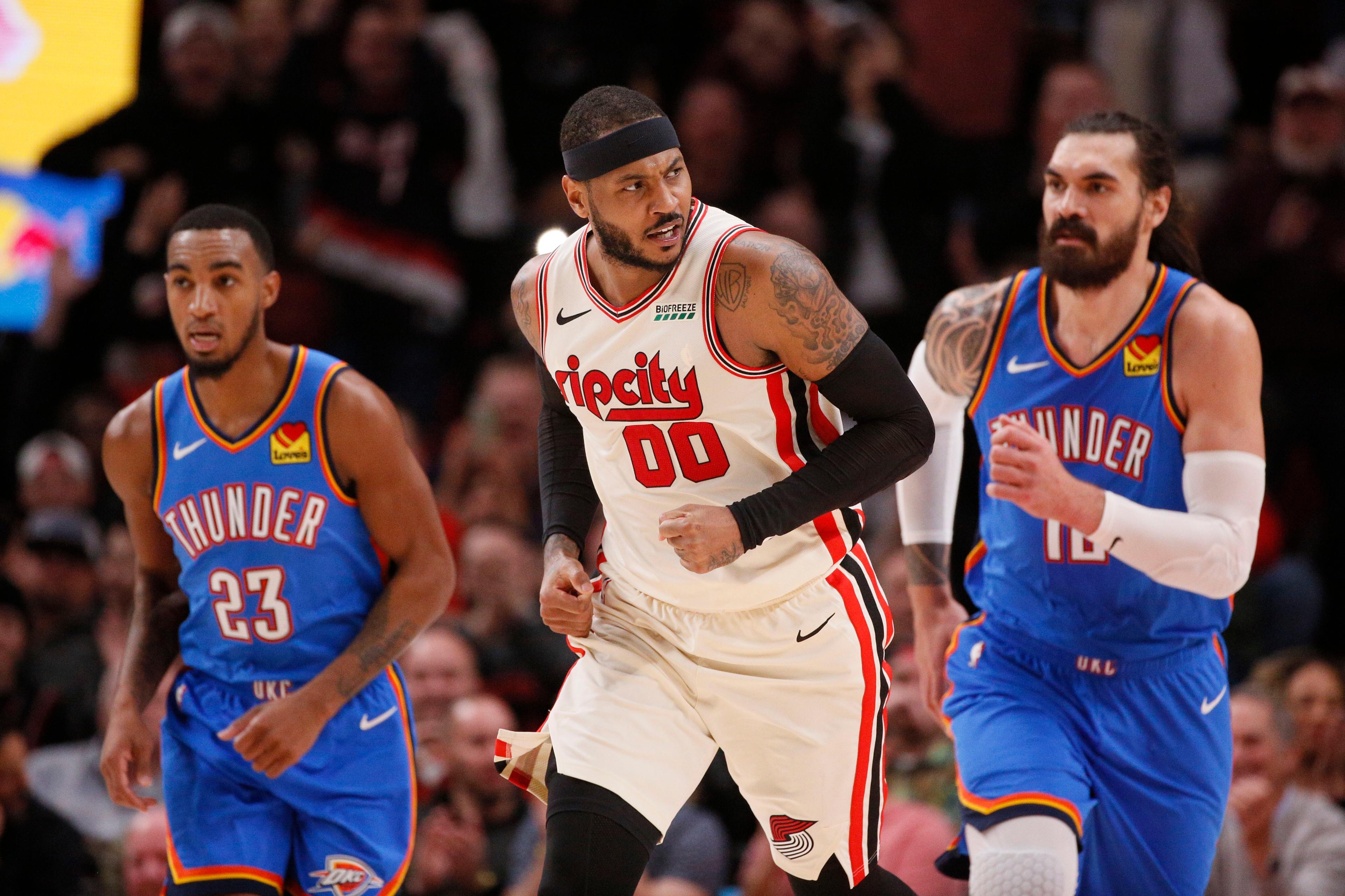 Nov 27, 2019; Portland, OR, USA; Portland Trail Blazers power forward Carmelo Anthony (00) reacts after his dunks against the Oklahoma City Thunder during the second half at Moda Center. Mandatory Credit: Soobum Im-USA TODAY Sports