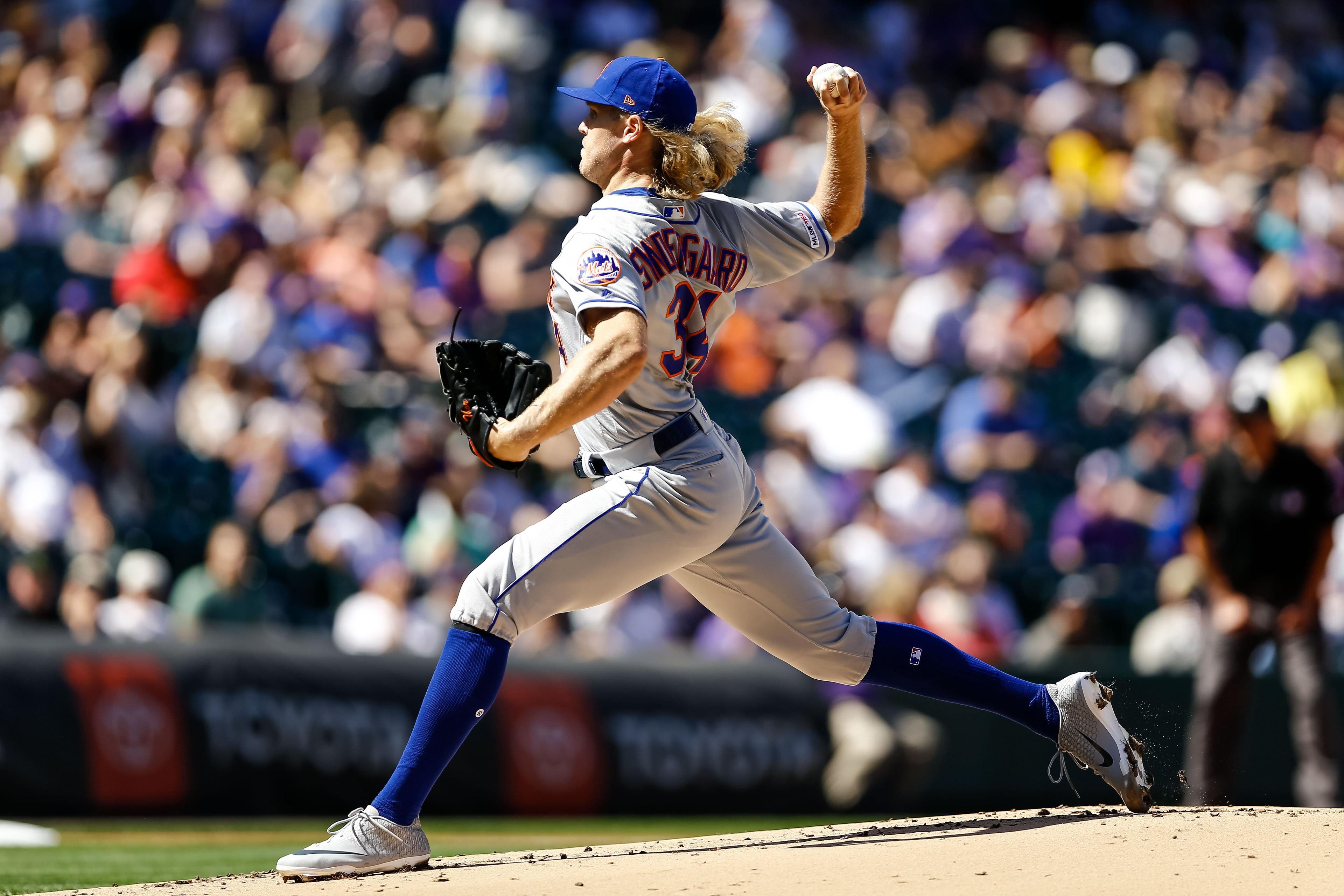 Sep 18, 2019; Denver, CO, USA; New York Mets starting pitcher Noah Syndergaard (34) pitches against the Colorado Rockies in the first inning at Coors Field. Mandatory Credit: Isaiah J. Downing-USA TODAY Sports / Isaiah J. Downing