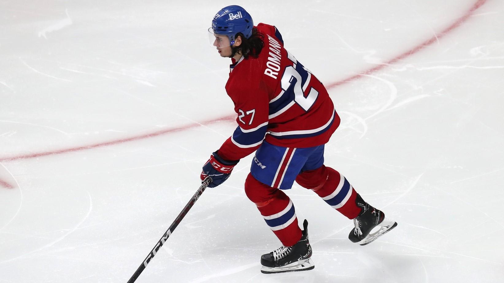 Apr 19, 2022; Montreal, Quebec, CAN; Montreal Canadiens defenseman Alexander Romanov (27) skates with the puck against Minnesota Wild during the third period at Bell Centre.