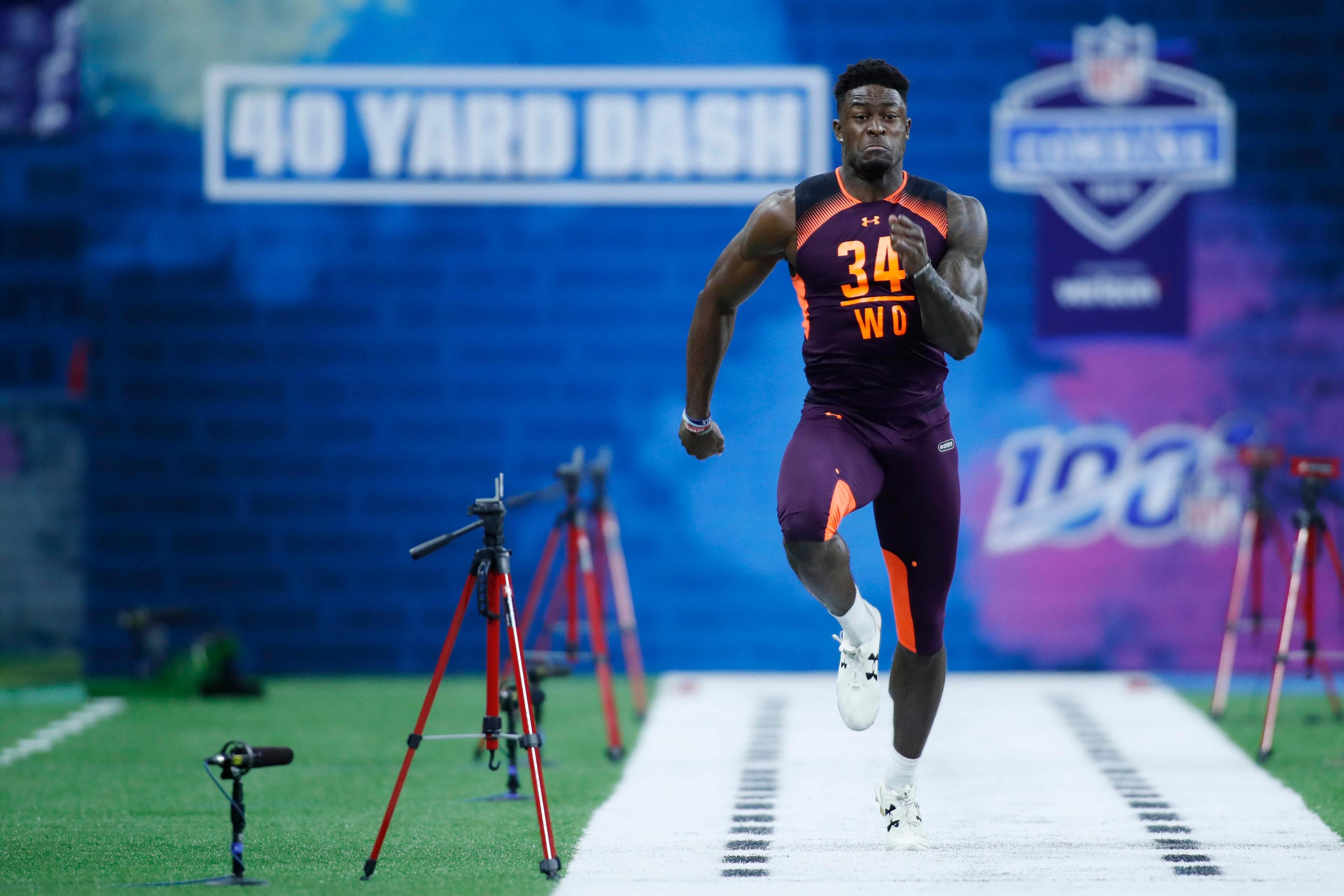 Mississippi wide receiver D.K. Metcalf runs the 40-yard dash during the 2019 NFL Combine at Lucas Oil Stadium. / Brian Spurlock/USA TODAY Sports