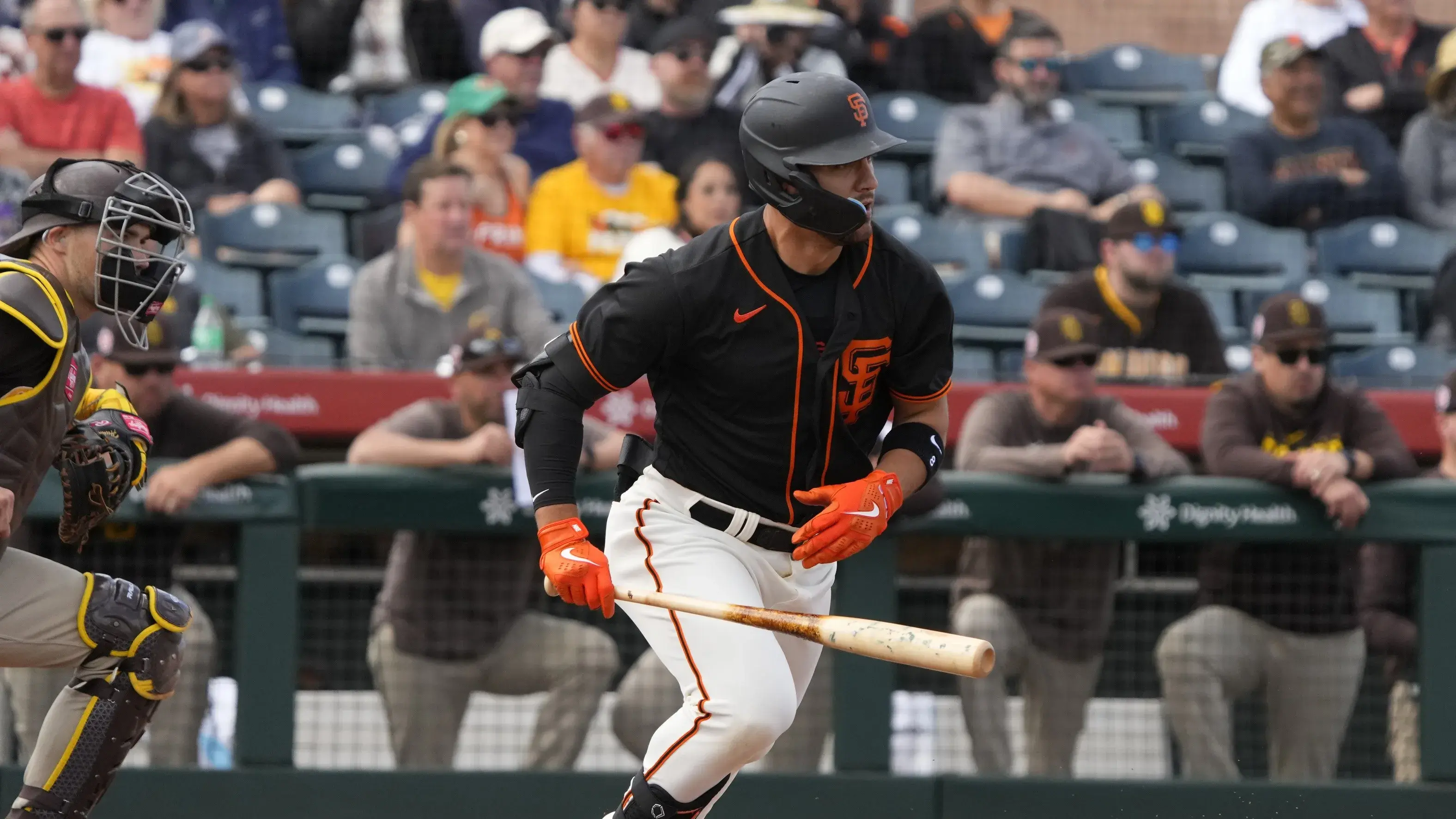 Feb 28, 2023; Scottsdale, Arizona, USA; San Francisco Giants right fielder Michael Conforto (8) hits an RBI grounder against the San Diego Padres in the third / Rick Scuteri-USA TODAY Sports