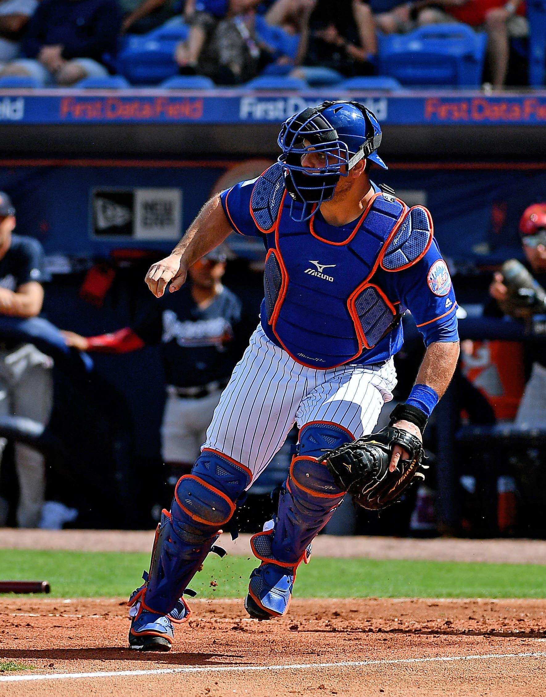 New York Mets catcher Devin Mesoraco plays during a spring training game against the Atlanta Braves at First Data Field. / Jasen Vinlove/USA TODAY Sports