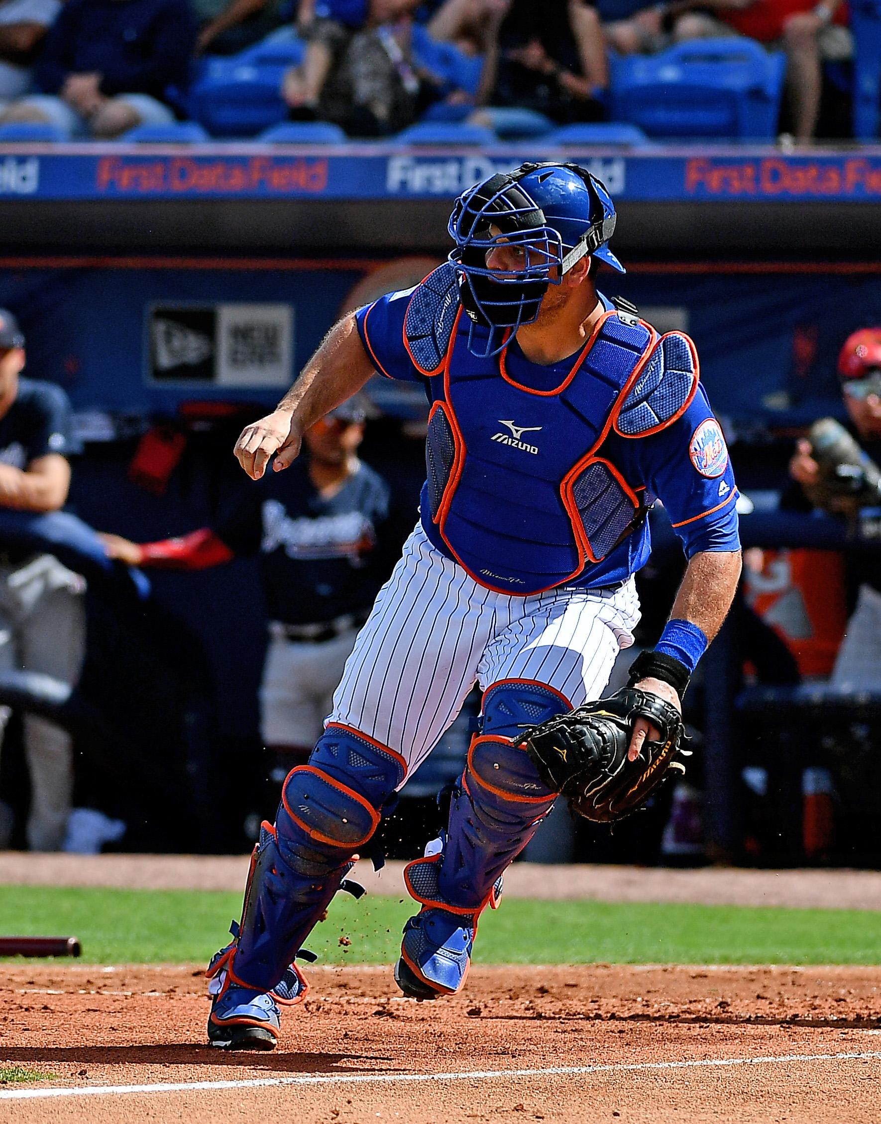 New York Mets catcher Devin Mesoraco plays during a spring training game against the Atlanta Braves at First Data Field.