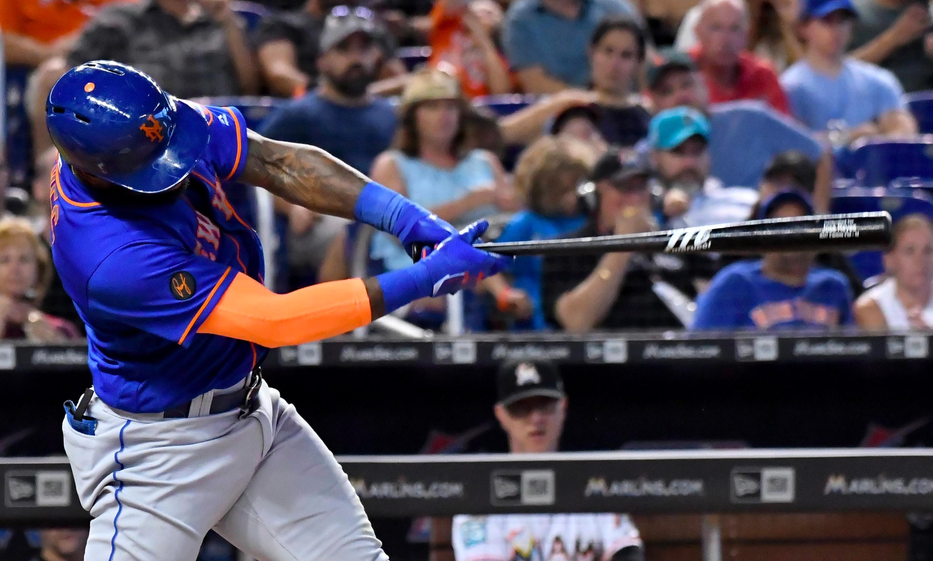 Jul 31, 2018; Washington, DC, USA; New York Mets shortstop Jose Reyes (7) pitches during the eighth inning Washington Nationals at Nationals Park. Mandatory Credit: Tommy Gilligan-USA TODAY Sports