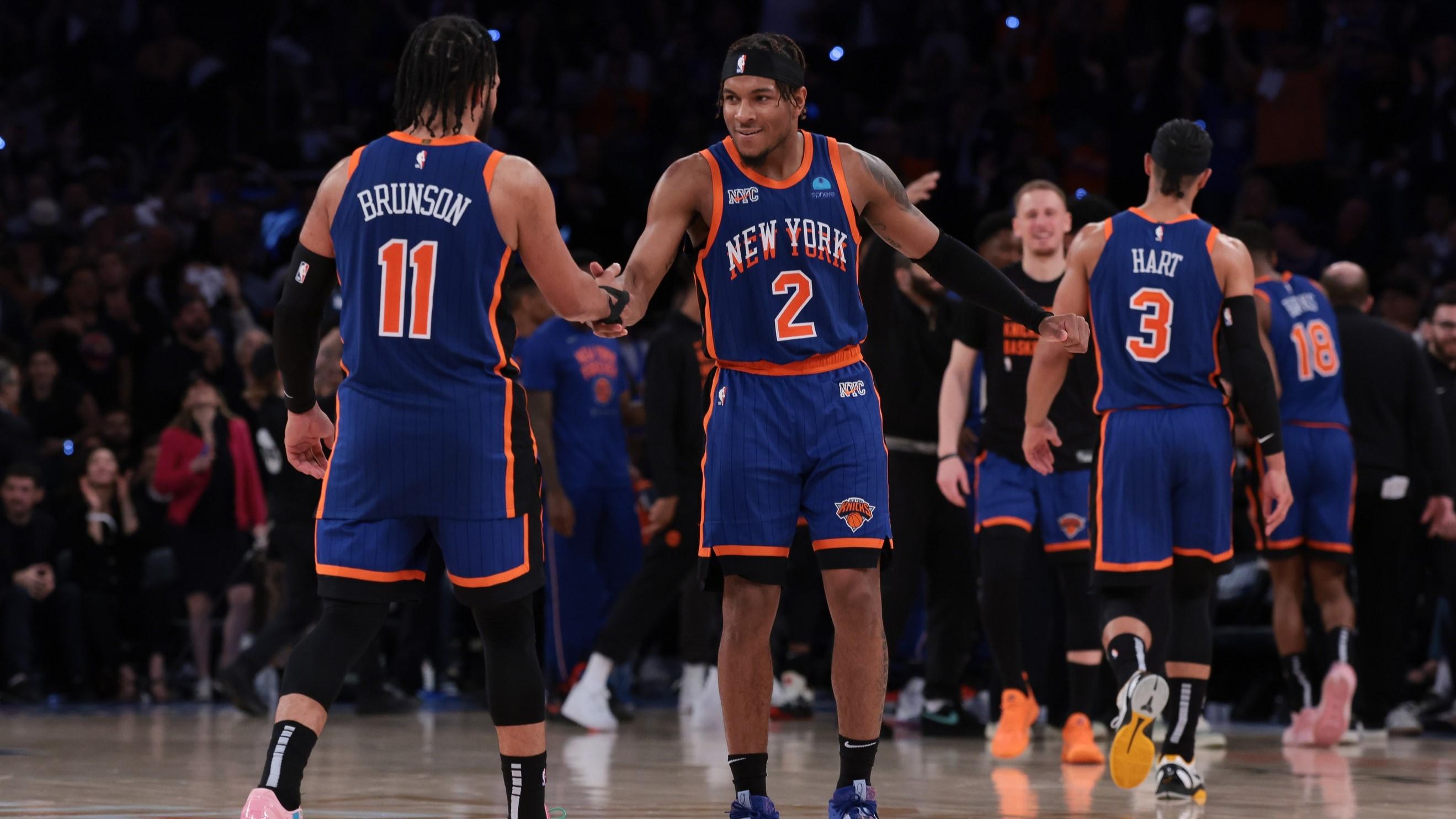 May 14, 2024; New York, New York, USA; New York Knicks guard Miles McBride (2) celebrates with guard Jalen Brunson (11) during the second half during game five of the second round for the 2024 NBA playoffs against the Indiana Pacers at Madison Square Garden.