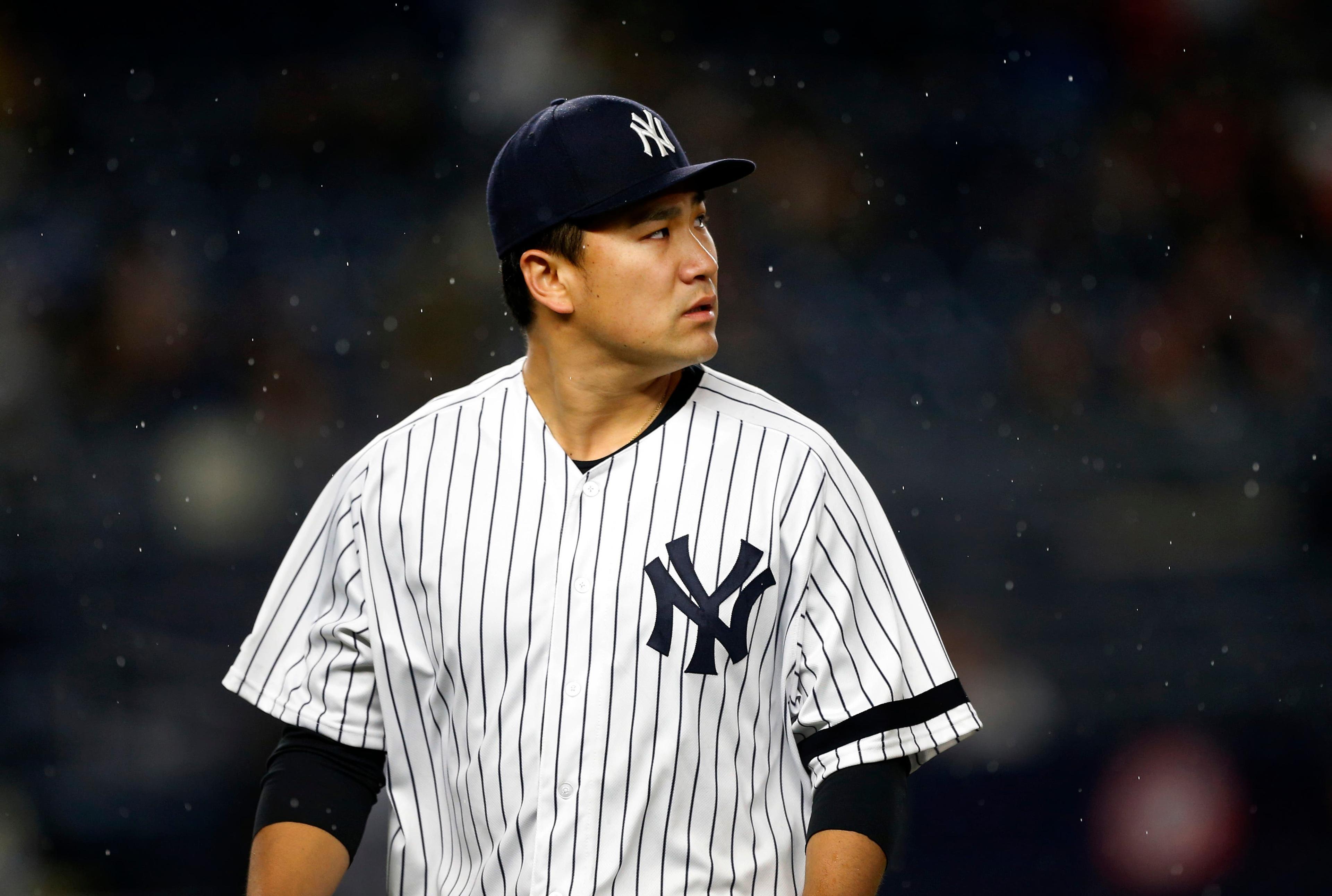 May 7, 2019; Bronx, NY, USA; New York Yankees starting pitcher Masahiro Tanaka (19) looks at the scoreboard on his way to the dugout between innings against the Seattle Mariners at Yankee Stadium. Mandatory Credit: Noah K. Murray-USA TODAY Sports / Noah K. Murray