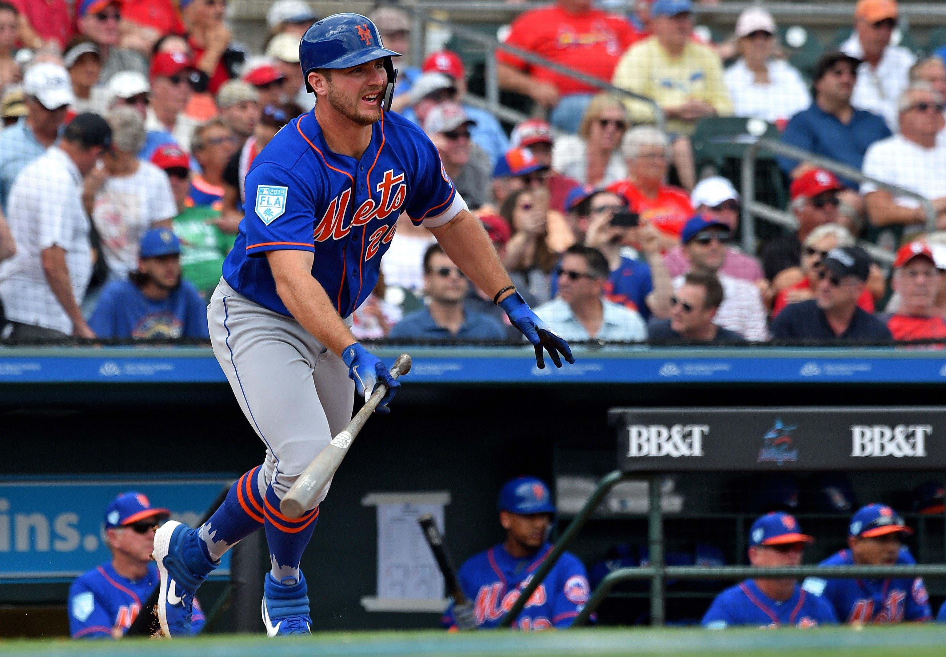 New York Mets infielder Pete Alonso connects for a base hit against the St. Louis Cardinals at Roger Dean Chevrolet Stadium. / Steve Mitchell/USA TODAY Sports