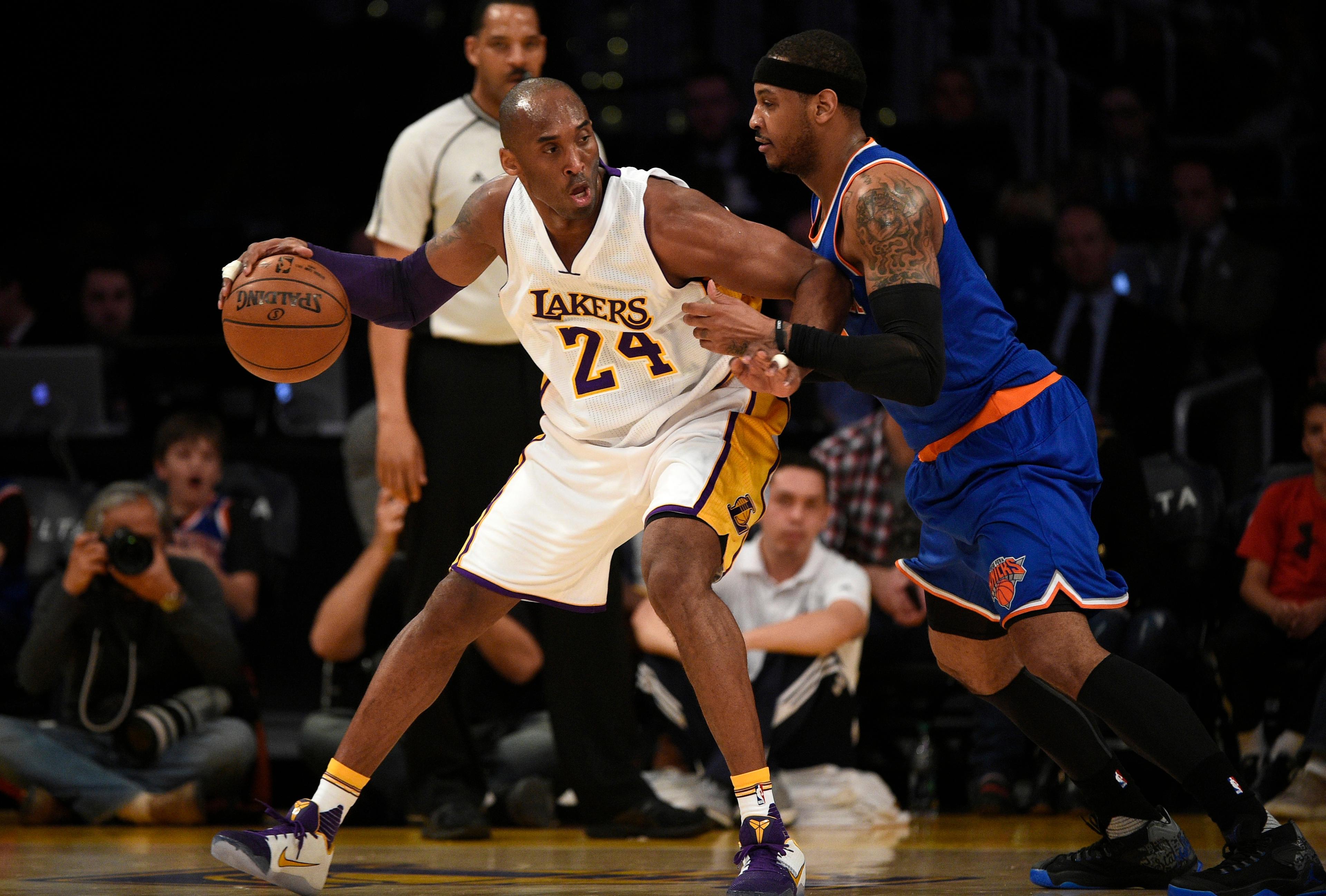 Mar 13, 2016; Los Angeles, CA, USA; Los Angeles Lakers forward Kobe Bryant (24) posts up on New York Knicks forward Carmelo Anthony (7) during the first quarter at Staples Center. Mandatory Credit: Kelvin Kuo-USA TODAY Sports